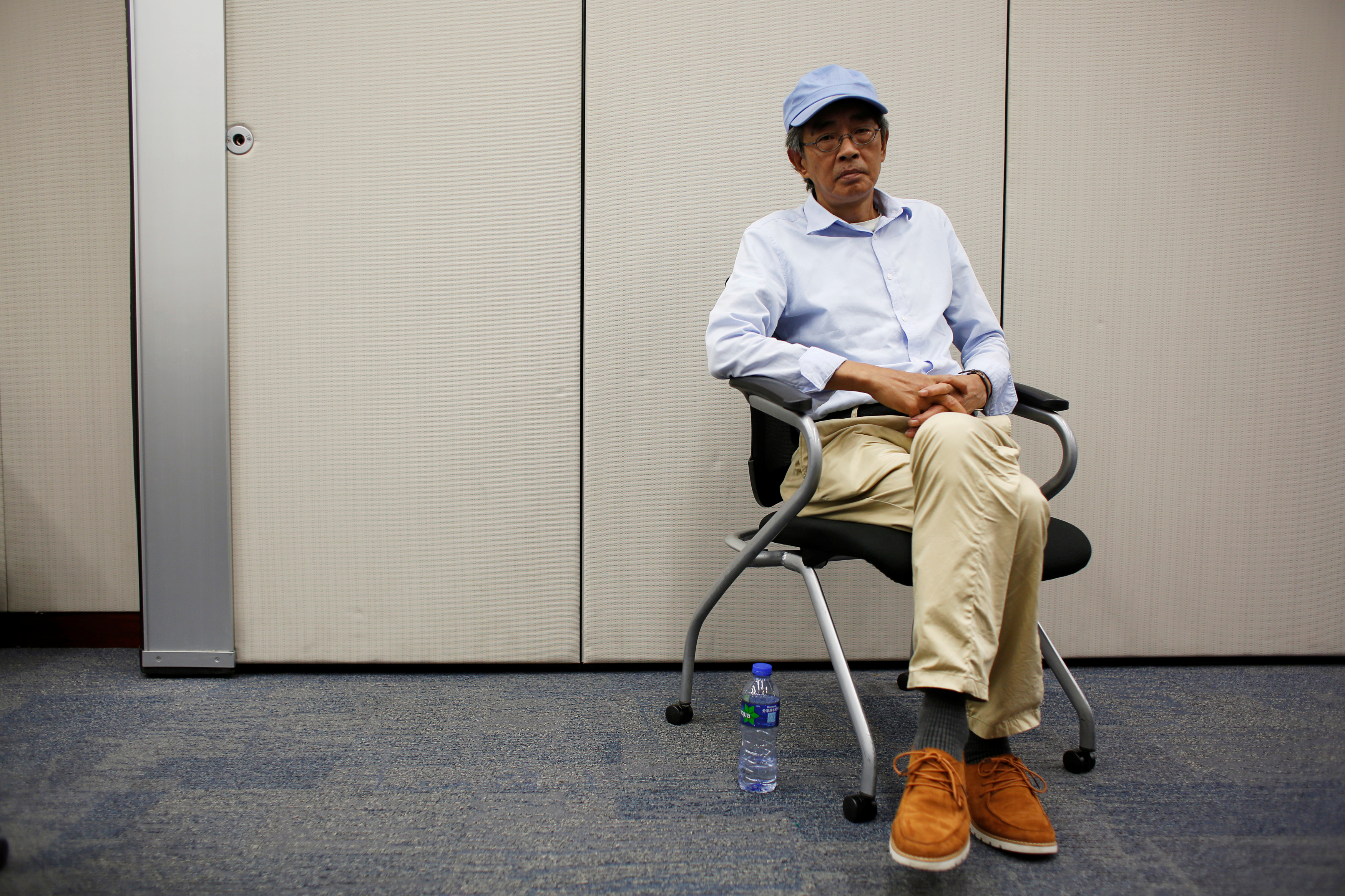 Bookseller Lam Wing-kee poses during an interview in Hong Kong