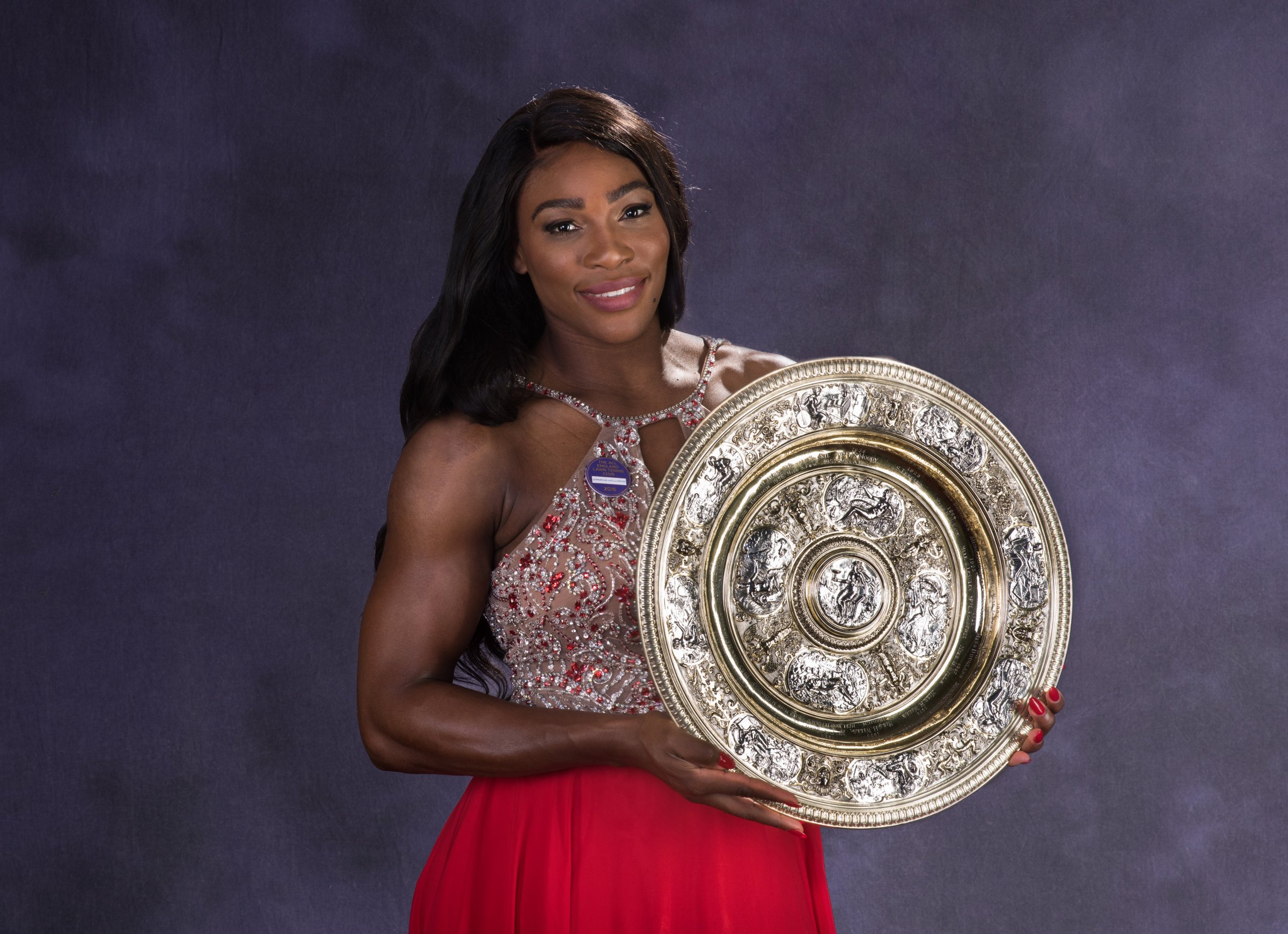 Wimbledon ladies singles Tennis Champion Serena Williams of the United States poses with the trophy at the Wimbledon Champions Dinner 2016 at the Guild Hall on July 10, 2016 in London, England.