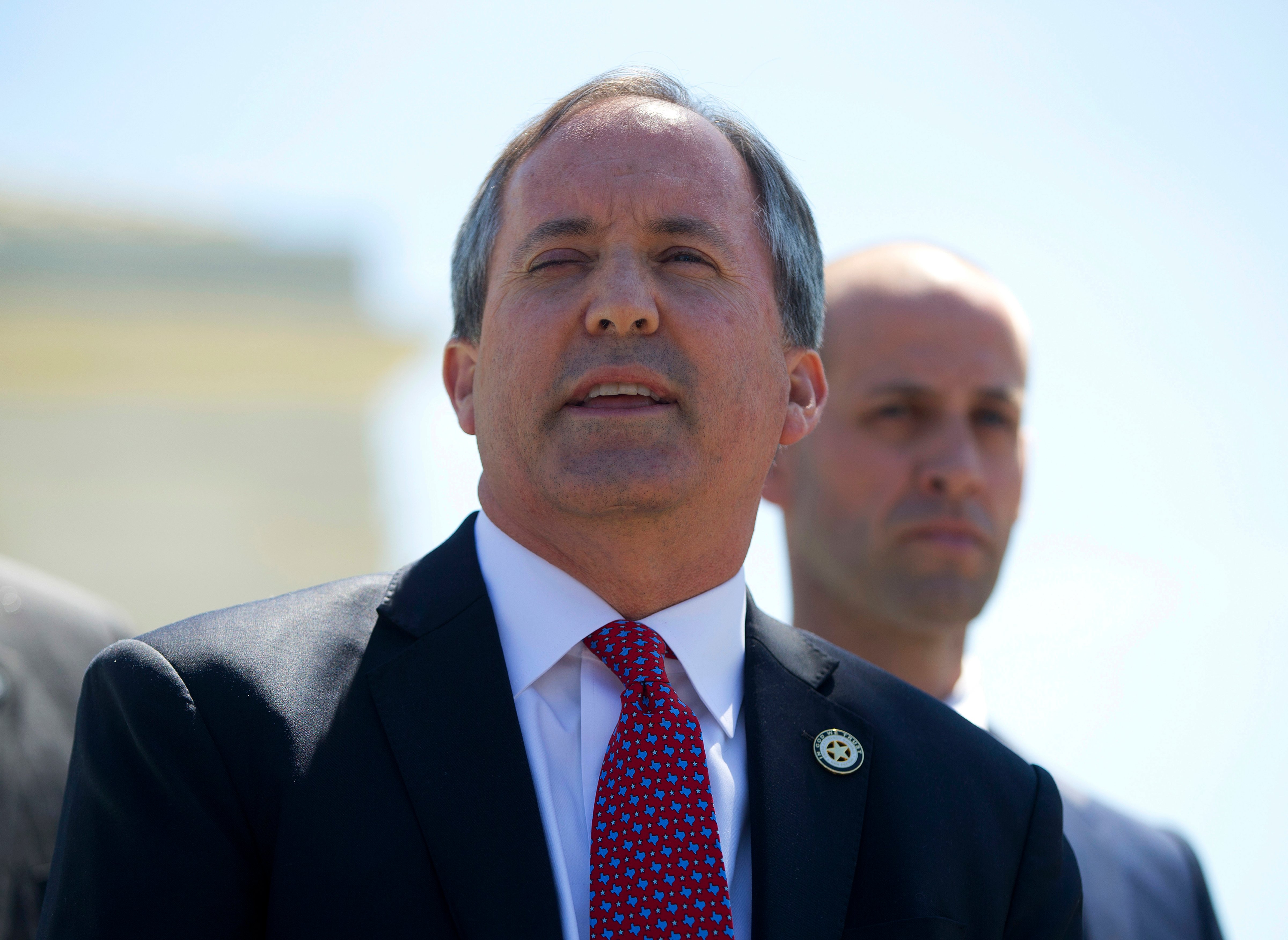 Texas Attorney General Ken Paxton meets with members of the media at the Supreme Court in Washington on April 18, 2016. (Pablo Martinez Monsivais&mdash;AP)