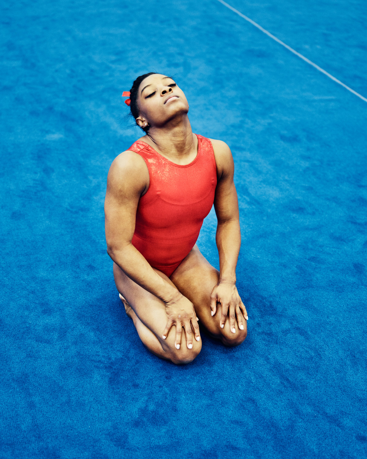 Gold Medal favorite Simone Biles stretches at her family’s World Champions Centre in Spring, TX on Thurs July 14, 2016. Biles competes in the Women’s team final on August 9, and the Women’s all-around individual final on August 11.