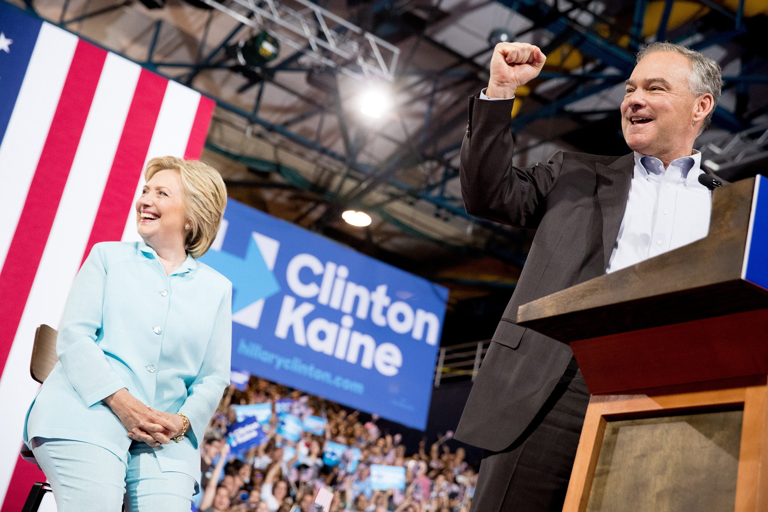 Sen. Tim Kaine, D-Va., right, accompanied by Democratic presidential candidate Hillary Clinton, left, speaks at a rally at Florida International University Panther Arena in Miami, Saturday, July 23, 2016. Clinton has chosen Kaine to be her running mate. (AP Photo/Andrew Harnik) (Andrew Harnik&mdash;AP)