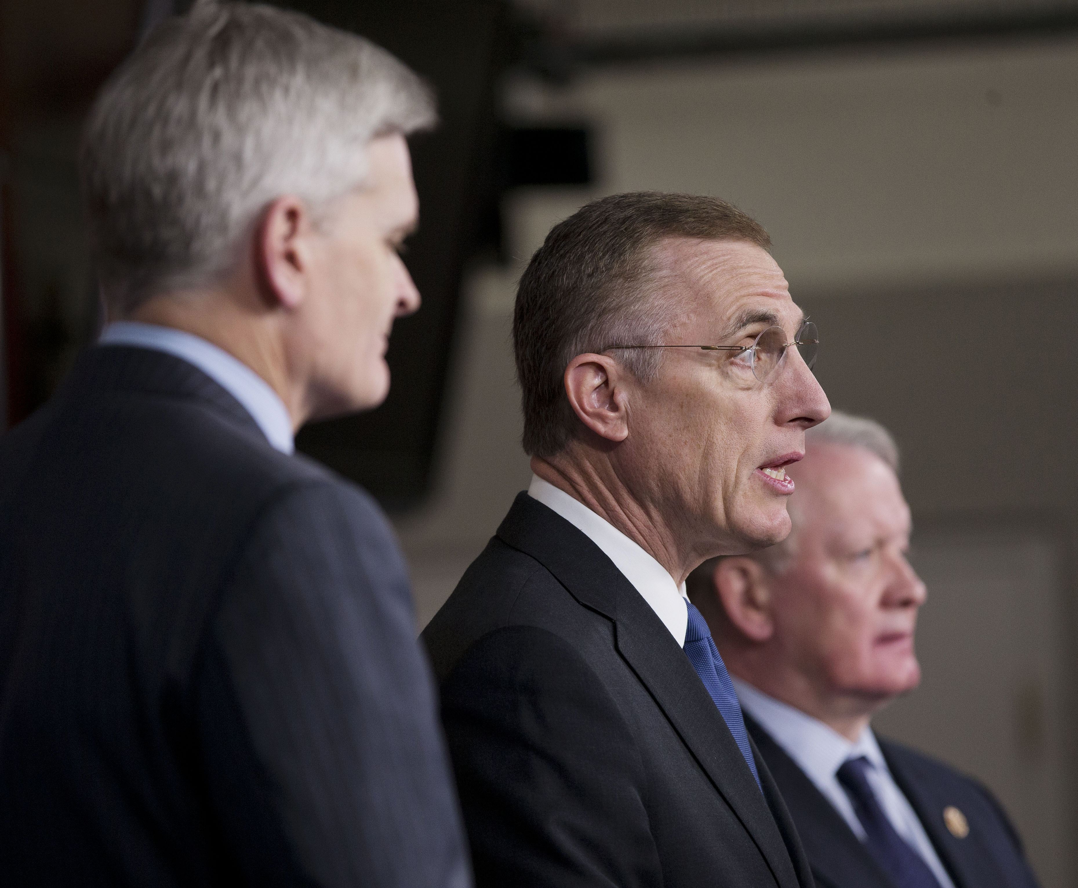 Rep. Tim Murphy, R-Pa., center, flanked by Rep. Leonard Lance, R-N.J.., right, and Rep. Bill Cassidy, R-La., speaks during a news conference on Capitol Hill to discuss a  legislative package of major mental health reforms on Dec. 12, 2013. The legislation passed the House Wednesday. (Pablo Martinez Monsivais&mdash;AP)