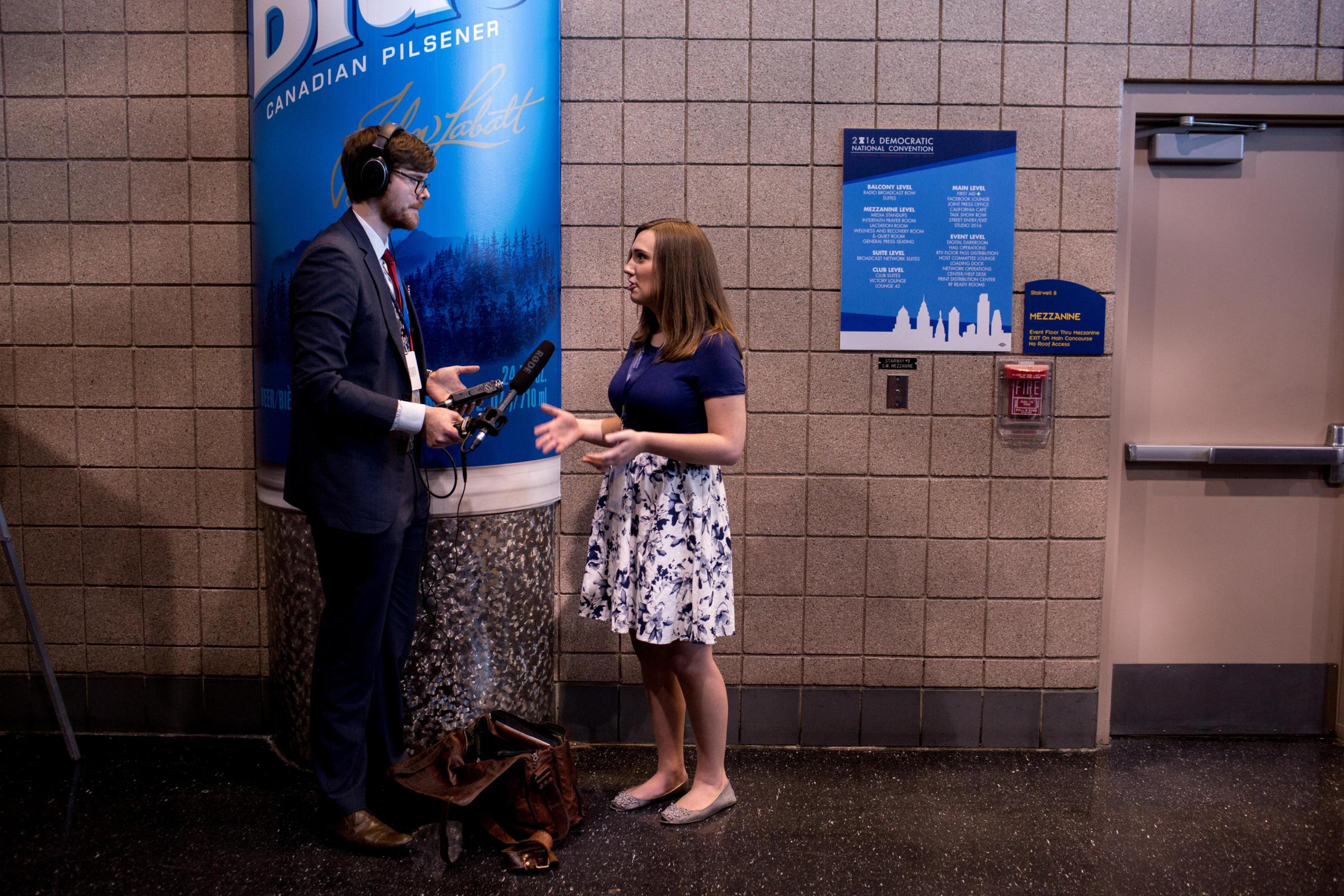 Sarah McBride is interviewed by a radio journalist at the Wells Fargo Center where she is attending Democratic National Convention on July 25, 2016 in Philadelphia.(Natalie Keyssar for TIME)