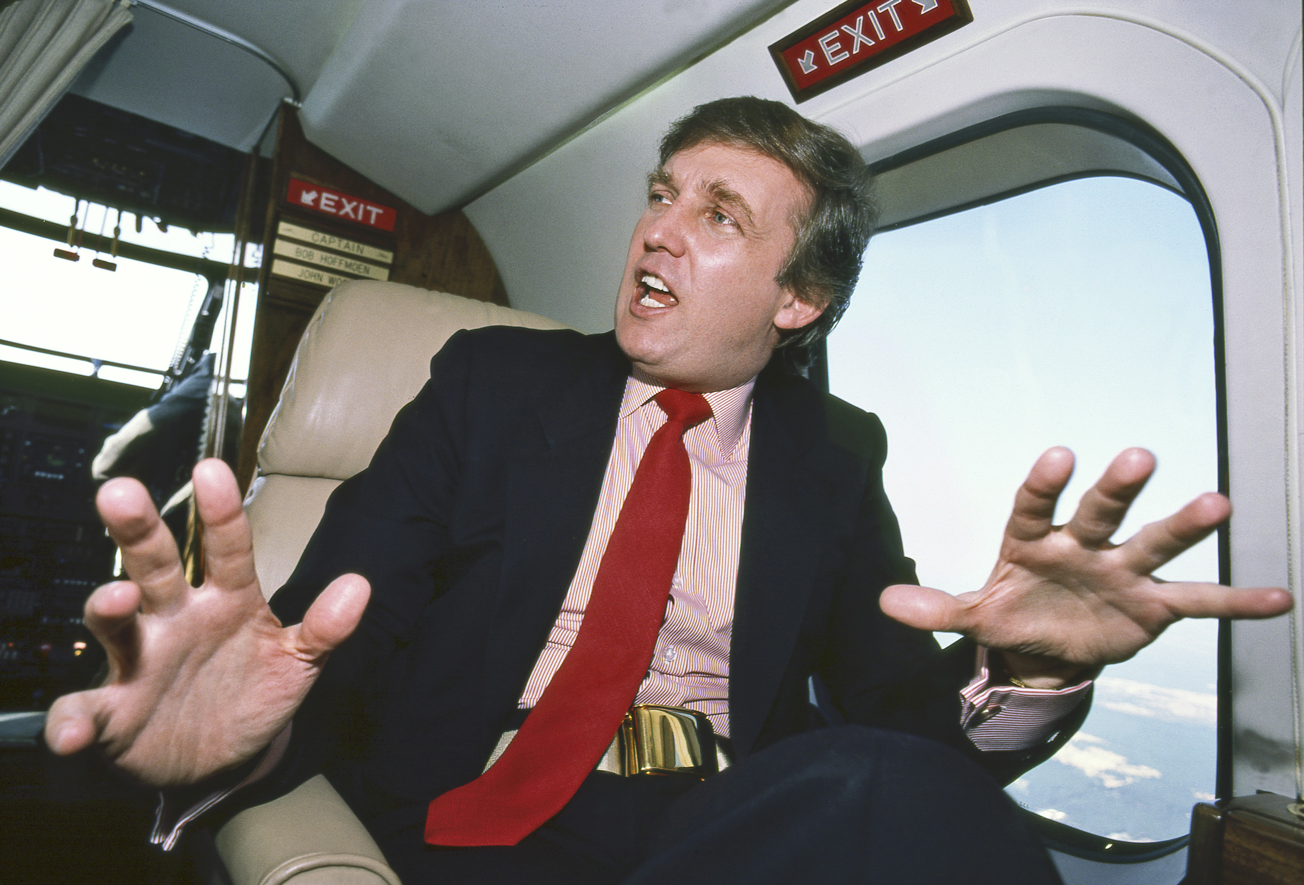1987 Trump gesticulates during a helicopter ride to Atlantic City. Benson, who prides himself on spontaneity and closeness, said he likes “to get people moving.”