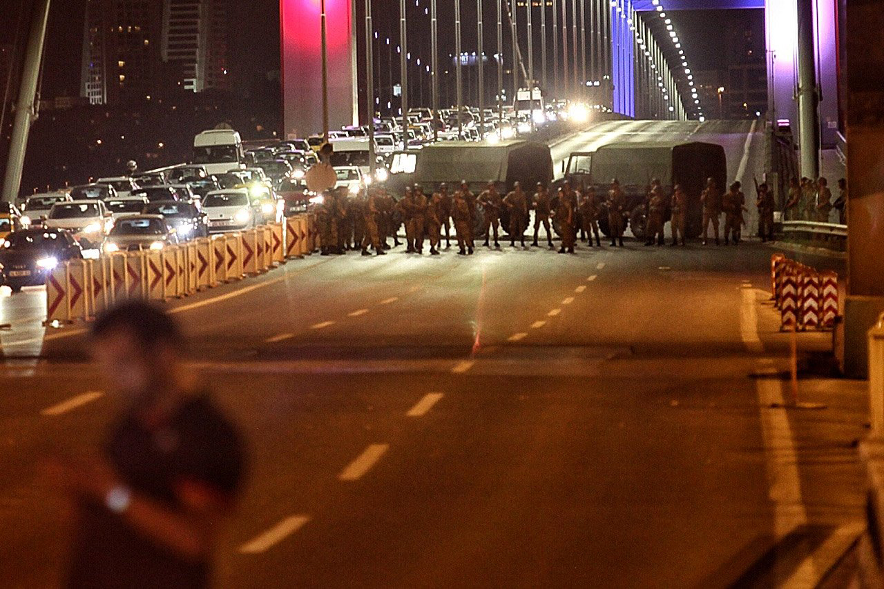 Turkish soldiers block Istanbul's Bosphorus Bridge, which separates the European and Asian sides of the city, on July 15, 2016.