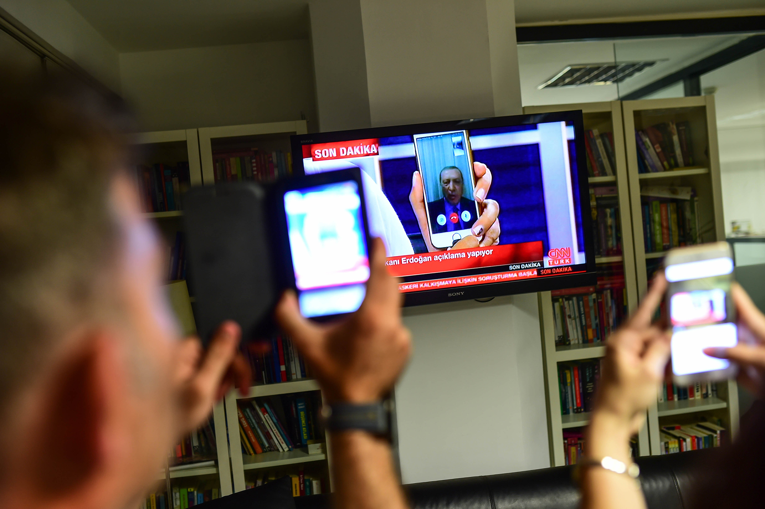 Turkish President Recep Tayyip Erdogan speaks on CNN Turk via FaceTime on July 15, 2016. (Burak Kara—Getty Images)