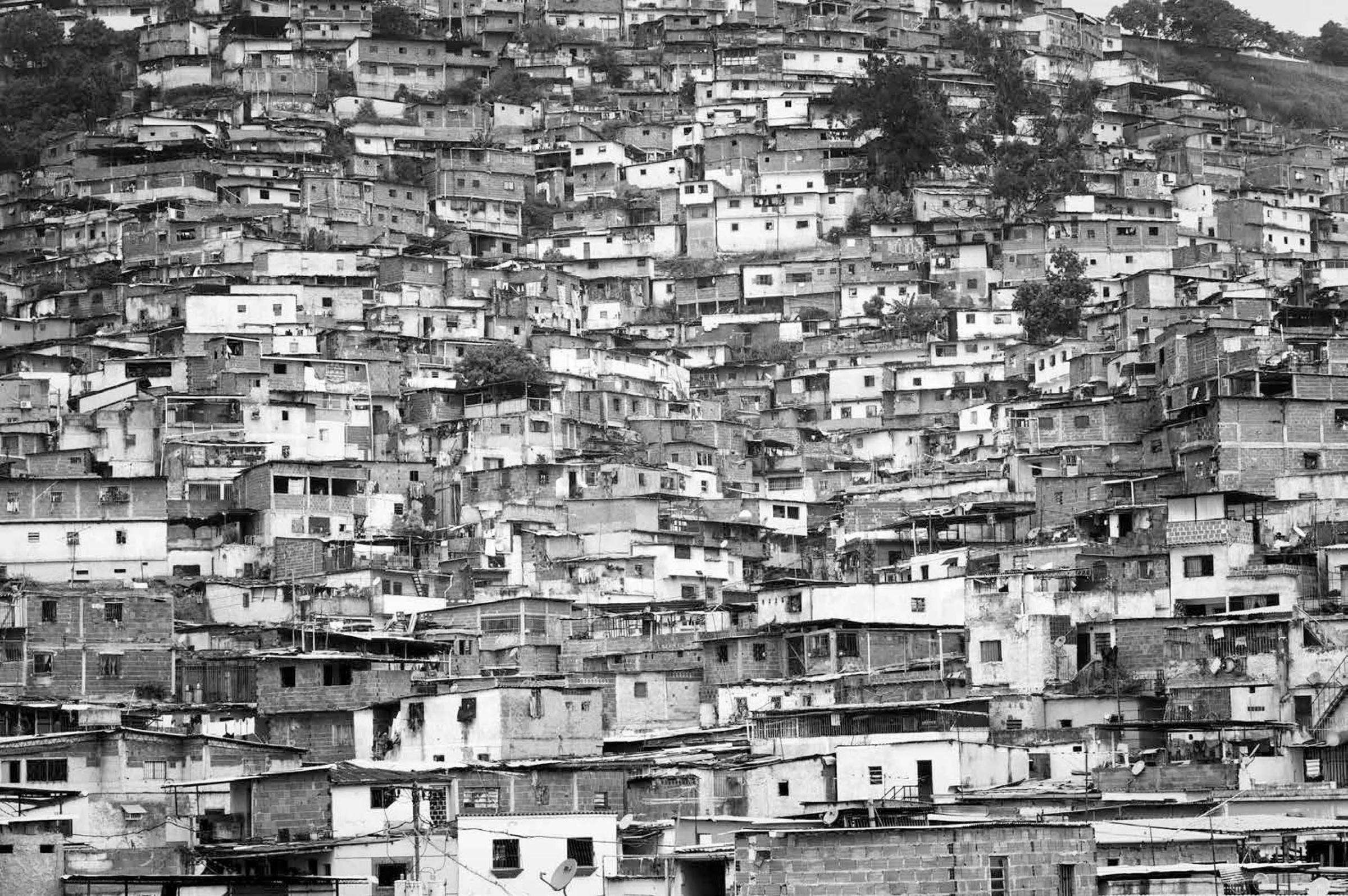 Catia, is one of the many slums in Caracas, Venezuela and a traditional stronghold of criminal gangs, known as colectivos. Supported by the government of President Hugo Chavez, the colectivos became ideologically left wing groups that helped serve the Bolivarian revolution, 2009.