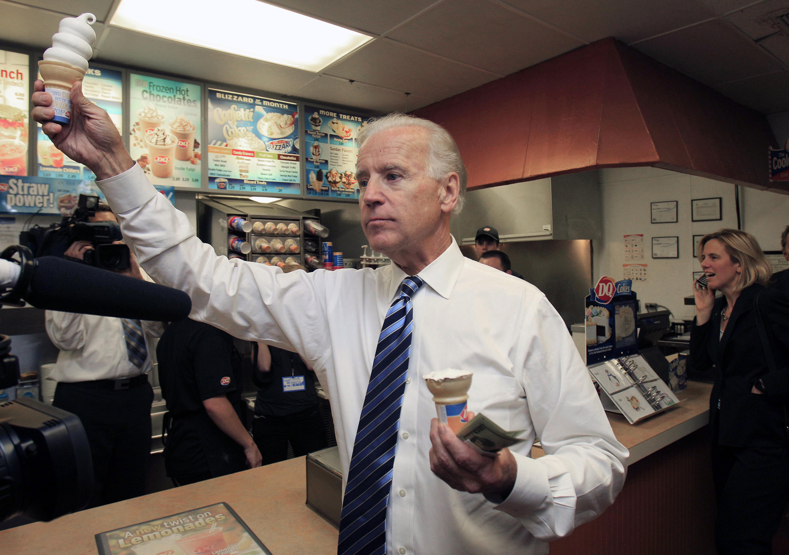 Vice President Joe Biden hands out ice cream cones after stopping at Dairy Queen in Steubenville, Ohio, on May 16, 2012.