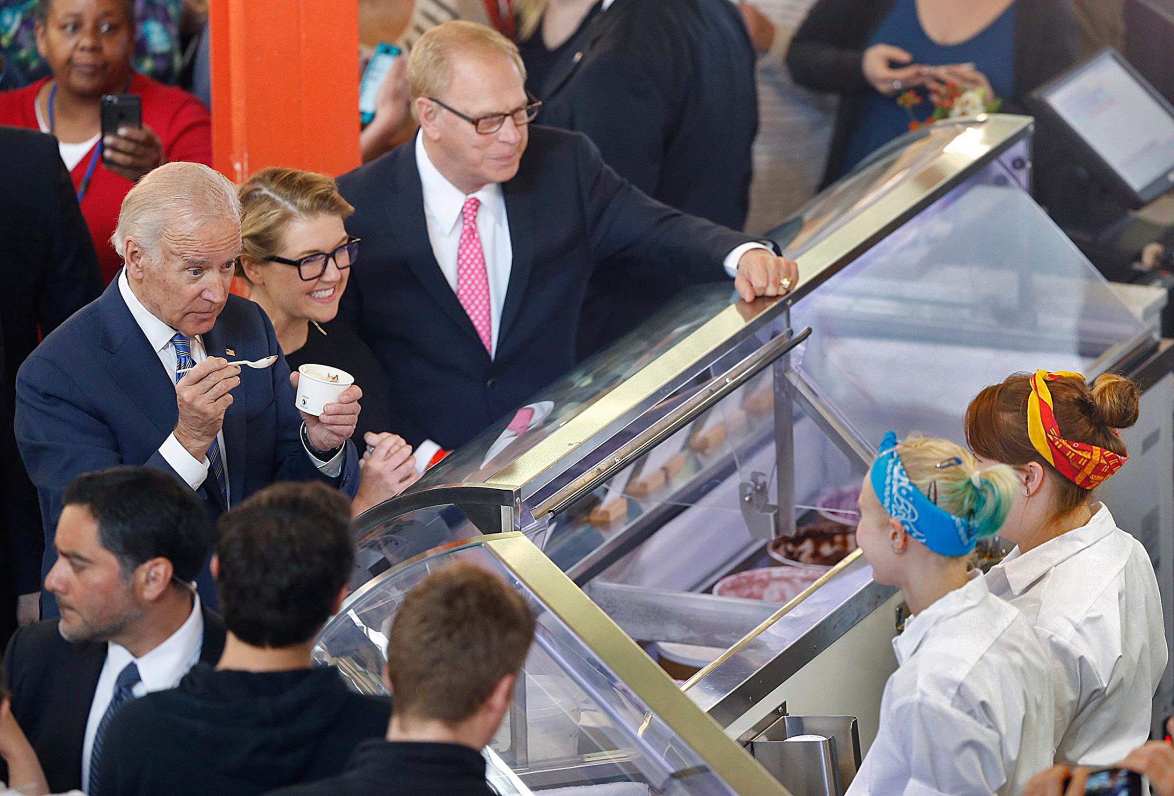 Vice President Joe Biden and Jeni's Spendid Ice Cream's founder Jeni Britton Bauer order some ice cream from her shop in the North Market in Columbus, Ohio on May 18, 2016.