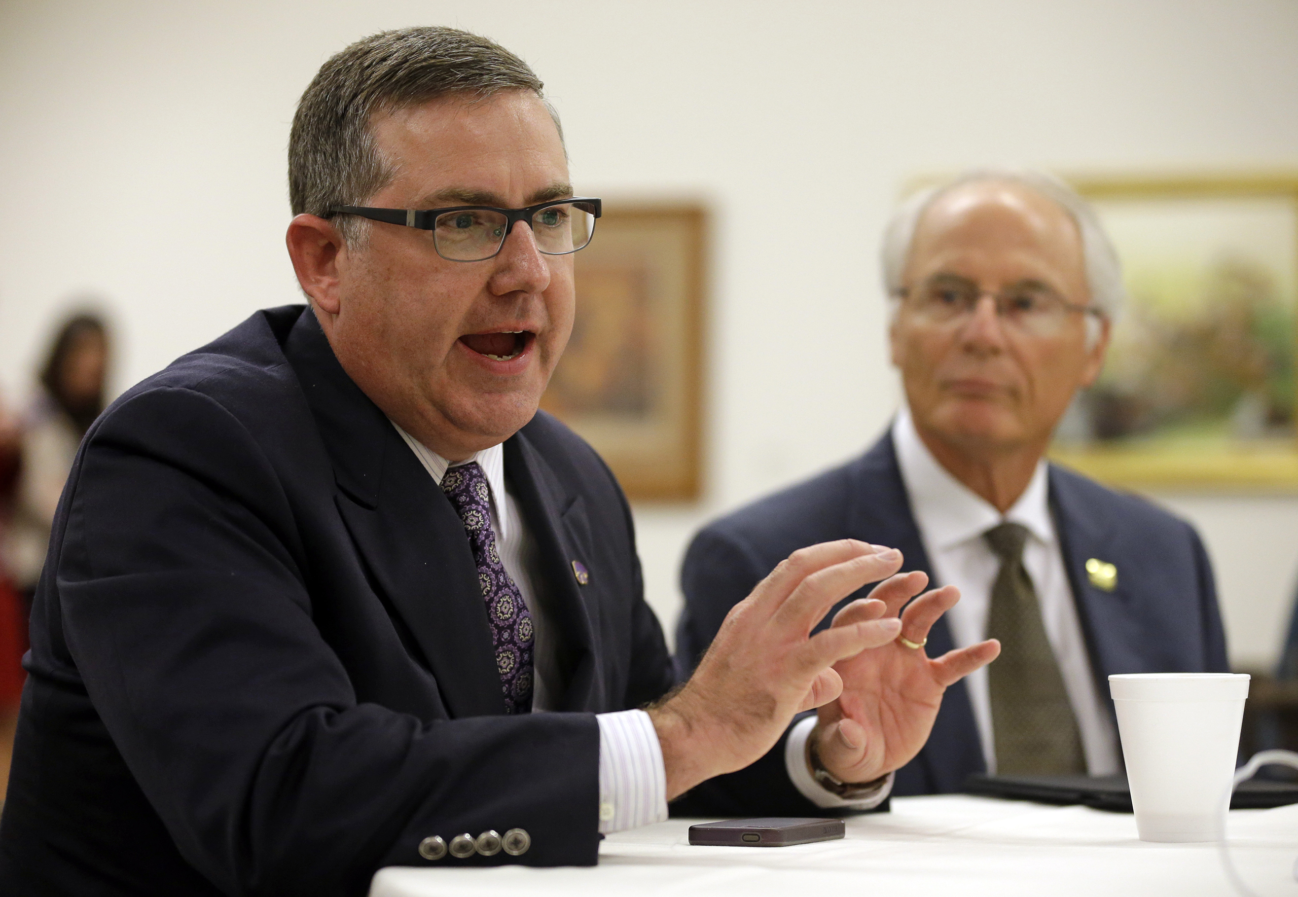 Wright State University president David R. Hopkins at NCAA headquarters in Indianapolis, Aug. 7, 2014. (Michael Conroy—AP)