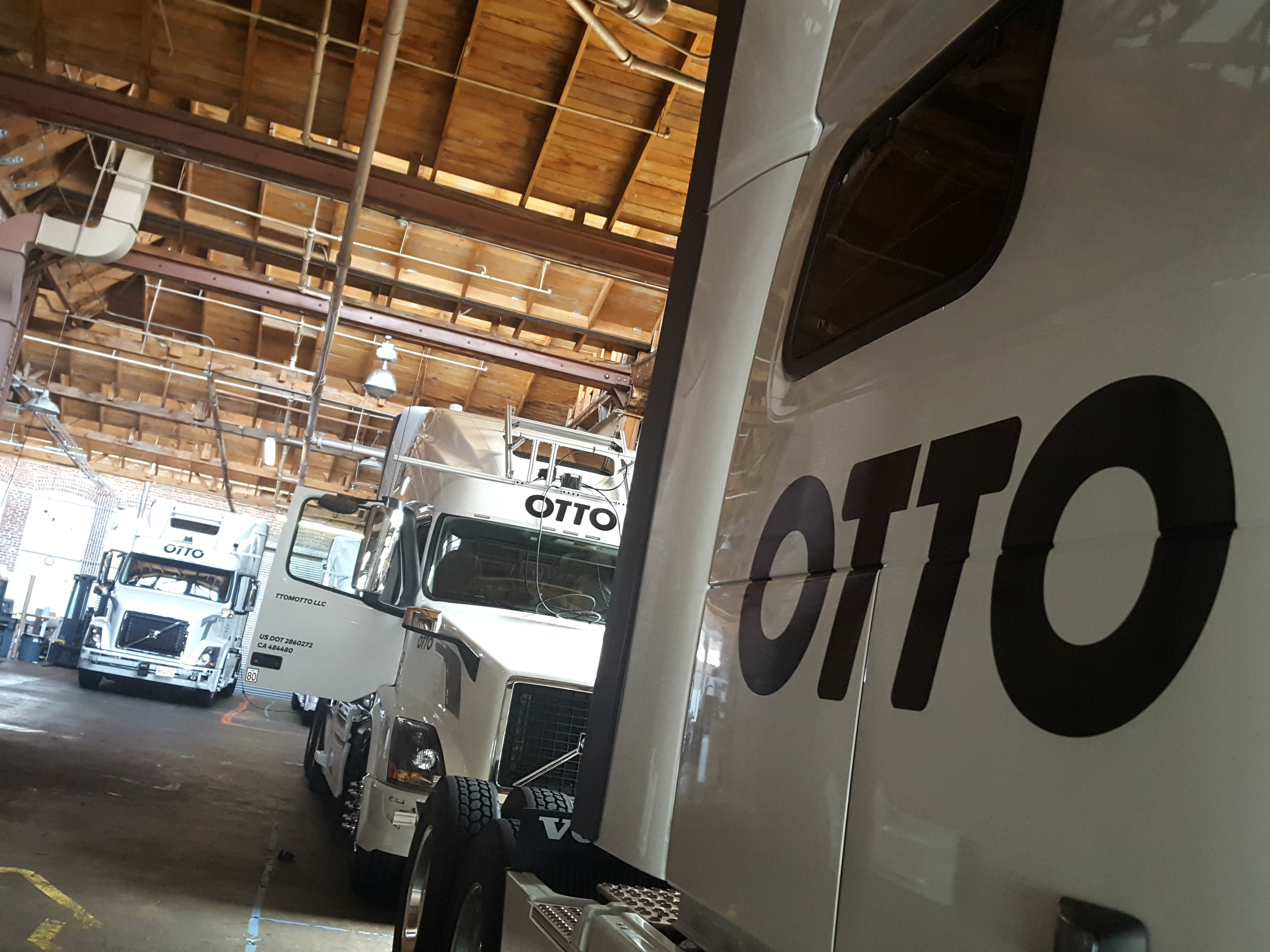 Five Volvo trucks outfitted with hardware for autonomous "cruising" sit in Otto's headquarters in San Francisco on Aug. 18, 2016. (Katy Steinmetz for TIME)