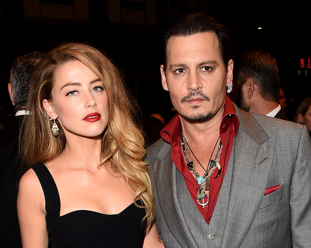 Actors Amber Heard (L) and Johnny Depp attend the "Black Mass" premiere during the 2015 Toronto International Film Festival at The Elgin on September 14, 2015 in Toronto, Canada. (Jason Merritt&mdash;Getty Images)