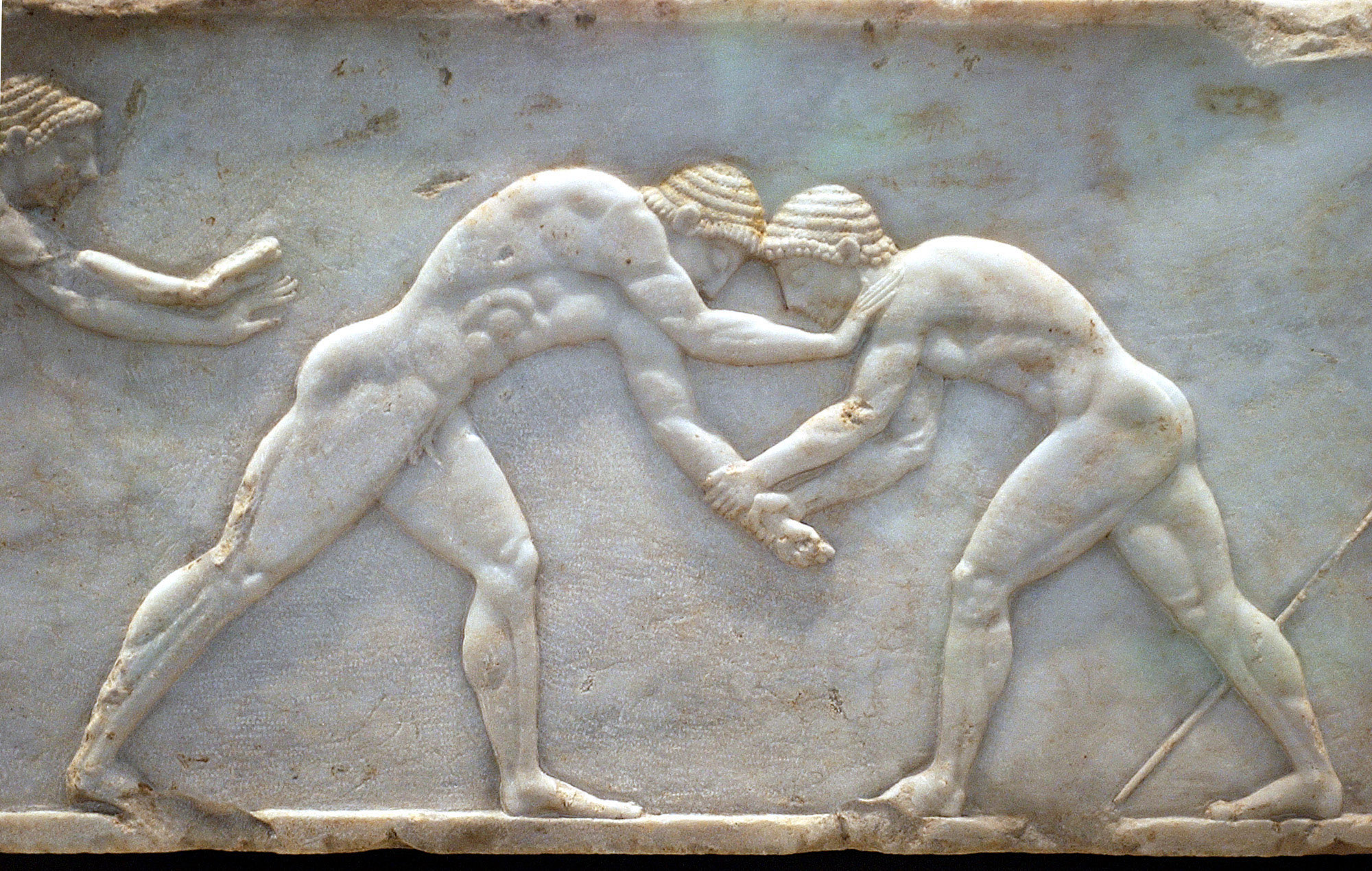 A marble sculpture of ancient Greek wrestlers from 510 BC is part of an exhibition at the National Archaeological Museum in Athens, July 15, 2004. (Petros Giannakouris—AP)