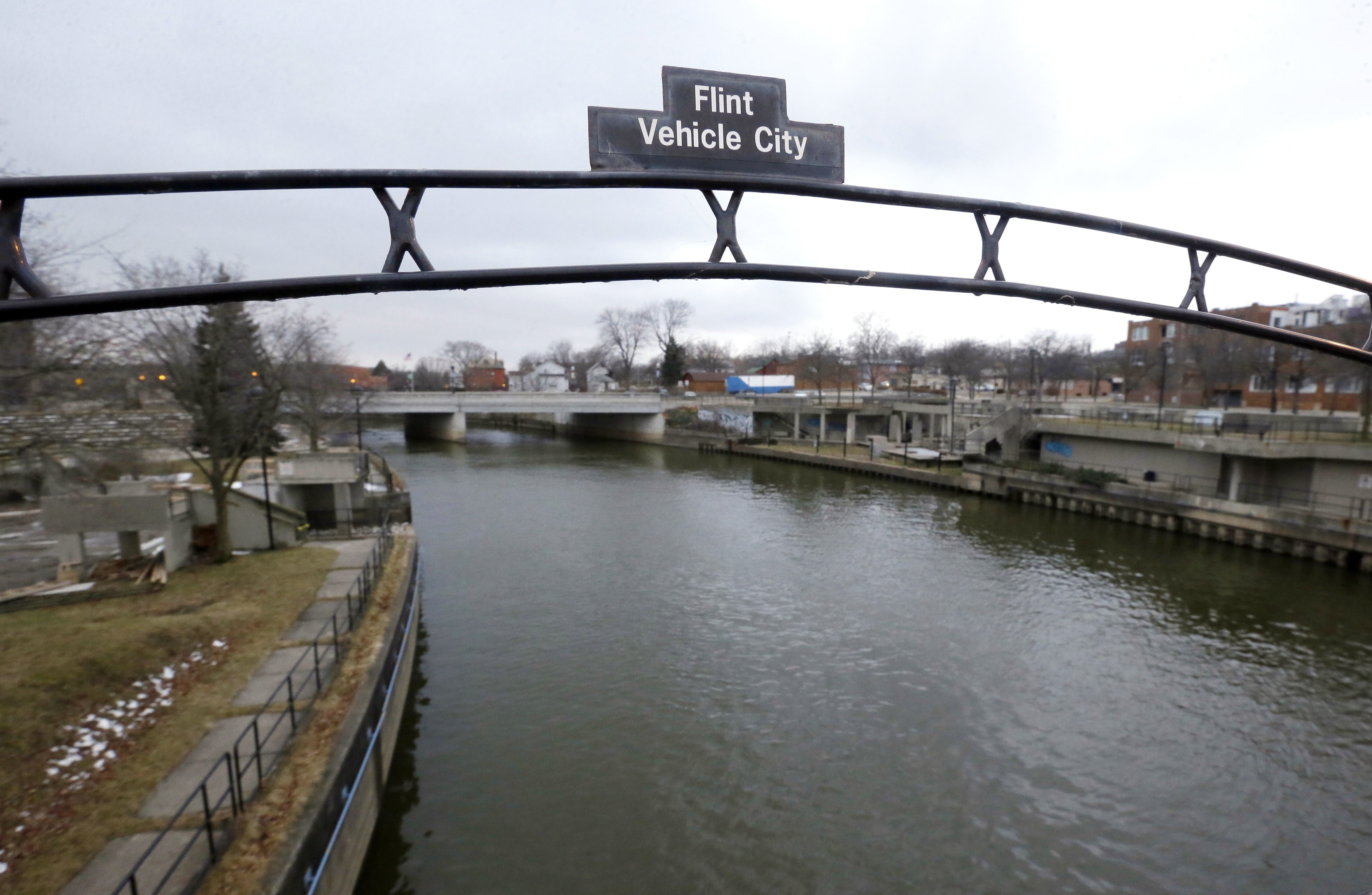 An estimated 8,000 children in Flint, Mich., were exposed to lead after the city switched water sources from Lake Huron to the Flint River, shown above, which one public health expert says will lead to $400 million in societal costs. (Carlos Osorio—AP)