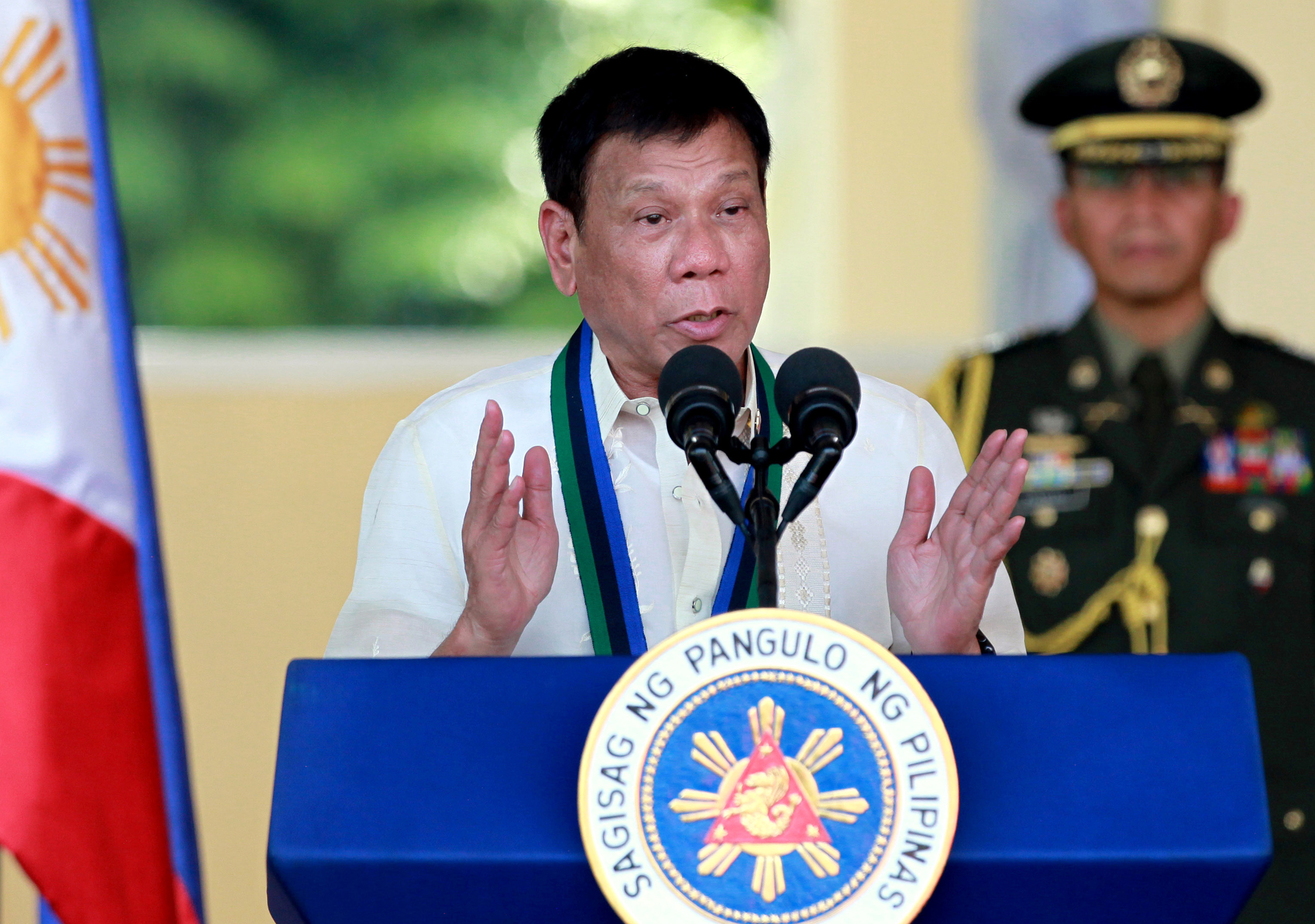 Philippine President Rodrigo Duterte addresses the troops during a military ceremony in suburban Quezon city, northeast of Manila, Philippines. (Bullit Marquez—AP)