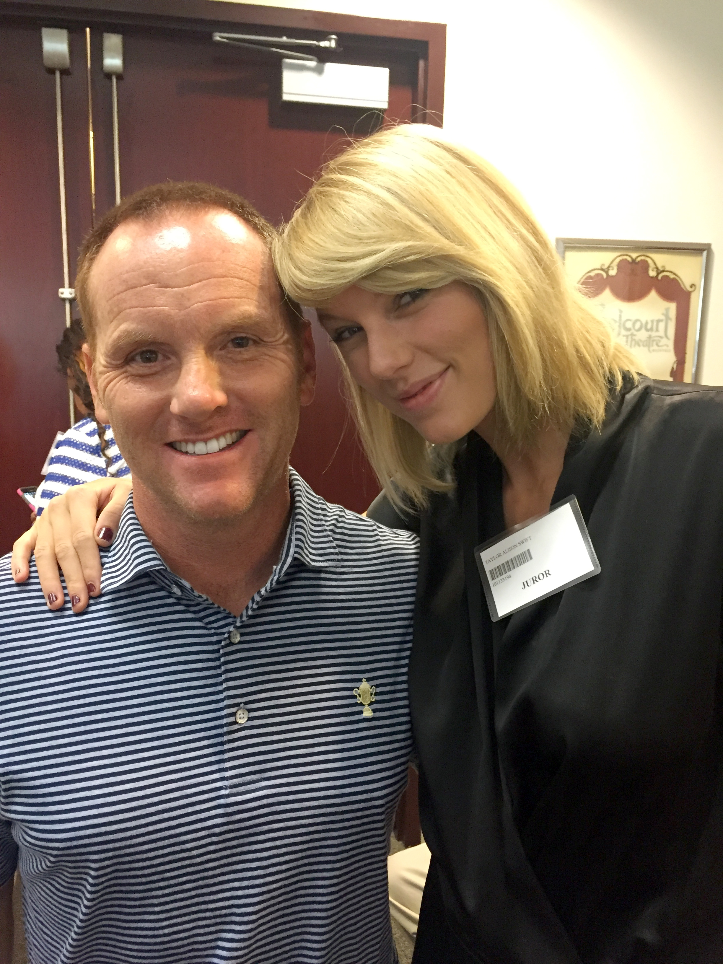 In this image provided by Bryan Merville, potential juror pop star Taylor Swift, right, poses for a photo with Bryan Merville in a courthouse waiting area in Nashville, Tenn., Monday, Aug. 29, 2016. A Nashville judge dismissed Swift as a potential juror in an aggravated rape and kidnapping case (Bryan Merville—AP)