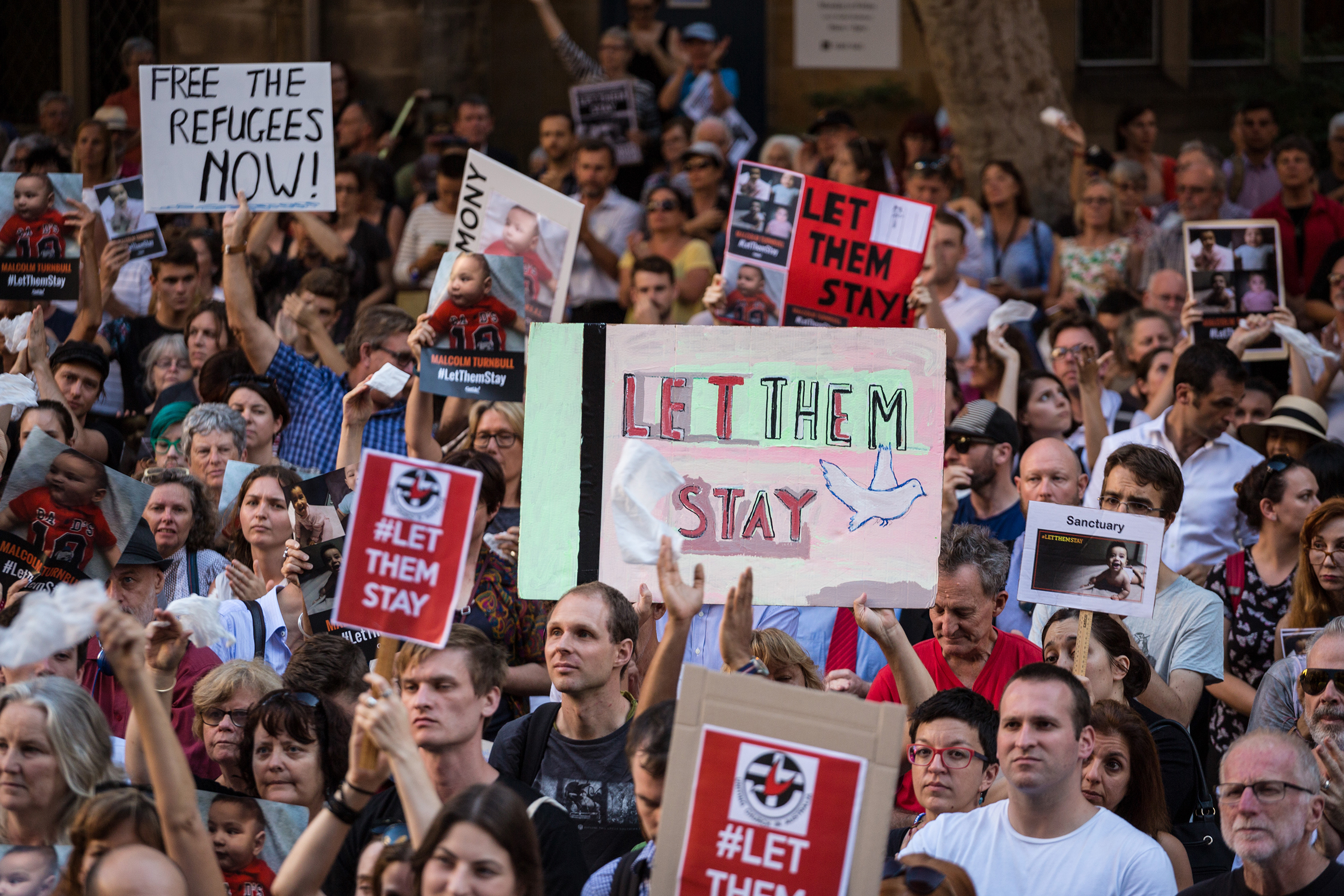 Thousands of protesters demonstrate at Town Hall Square in Sydney, Australia, on Feb. 8, 2016, against the offshore detention and detention of asylum seeker children to the offshore processing centers of Manus Island and Nauru. (Ahmad Salem—Pacific Press/Sipa USA/AP)