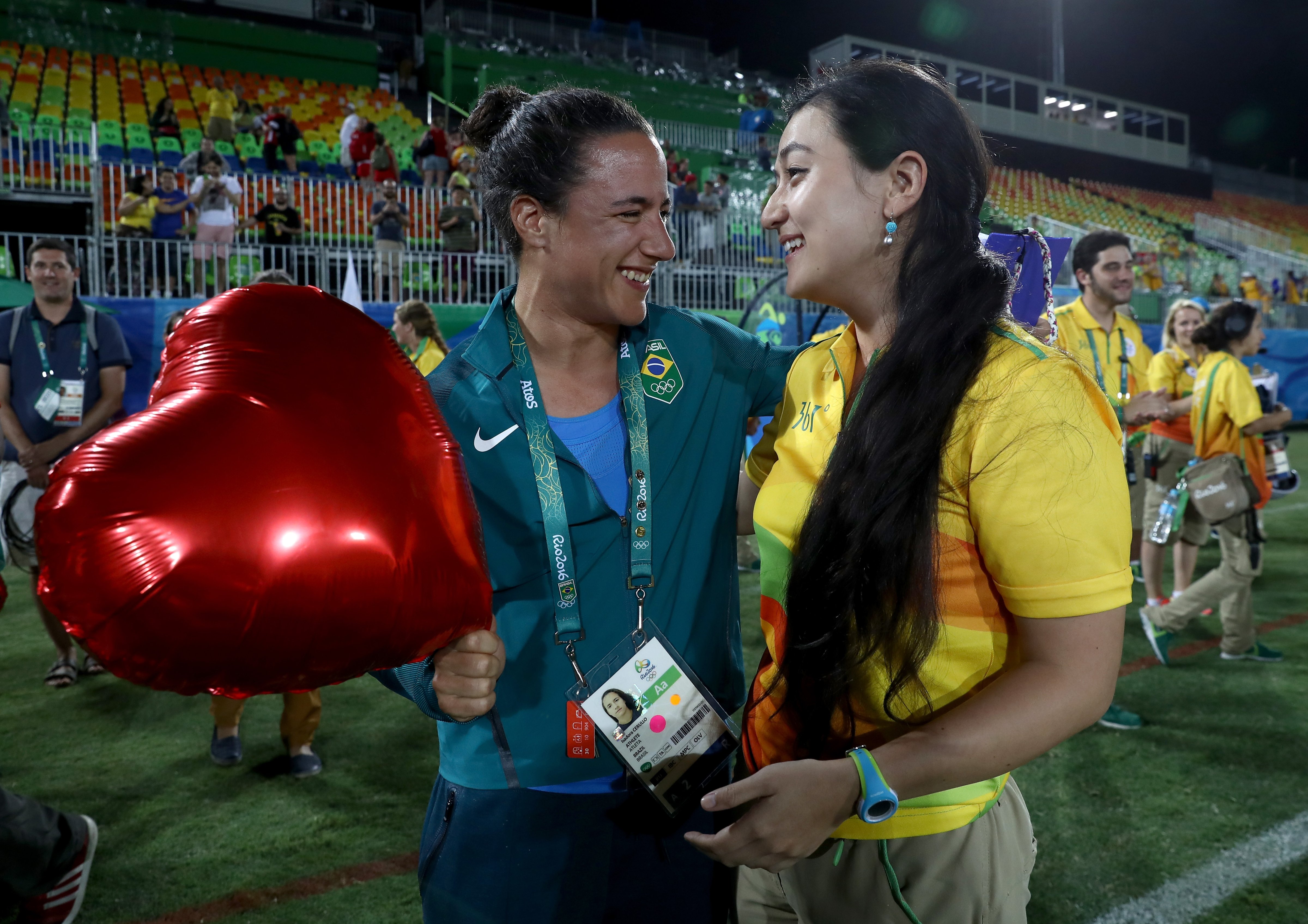 RIO DE JANEIRO, BRAZIL - AUGUST 08:  Volunteer Marjorie Enya (R) and rugby player Isadora Cerullo of Brazil smile after proposing marriage after the Women's Gold Medal Rugby Sevens match between Australia and New Zealand on Day 3 of the Rio 2016 Olympic Games at the Deodoro Stadium on August 8, 2016 in Rio de Janeiro, Brazil.  (Photo by David Rogers/Getty Images) (David Rogers/Getty Images)