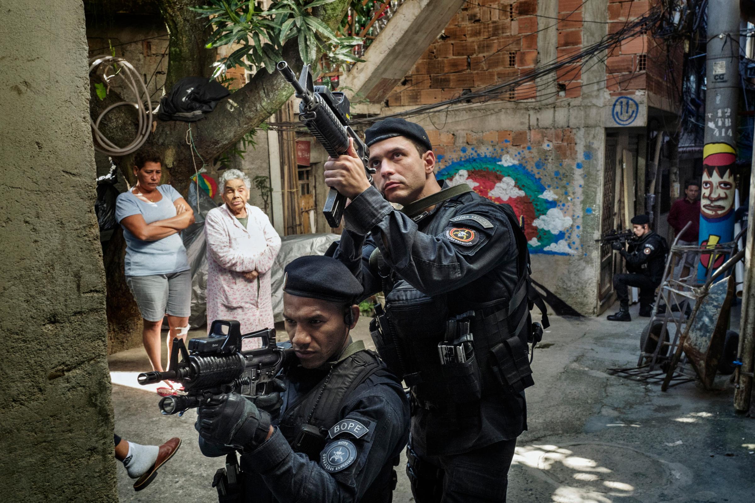 Members of the BOPE (Battalion of Special Police Operations) during an  exercise in a densely populated urban area in the Tavares favela in Rio de Janeiro.