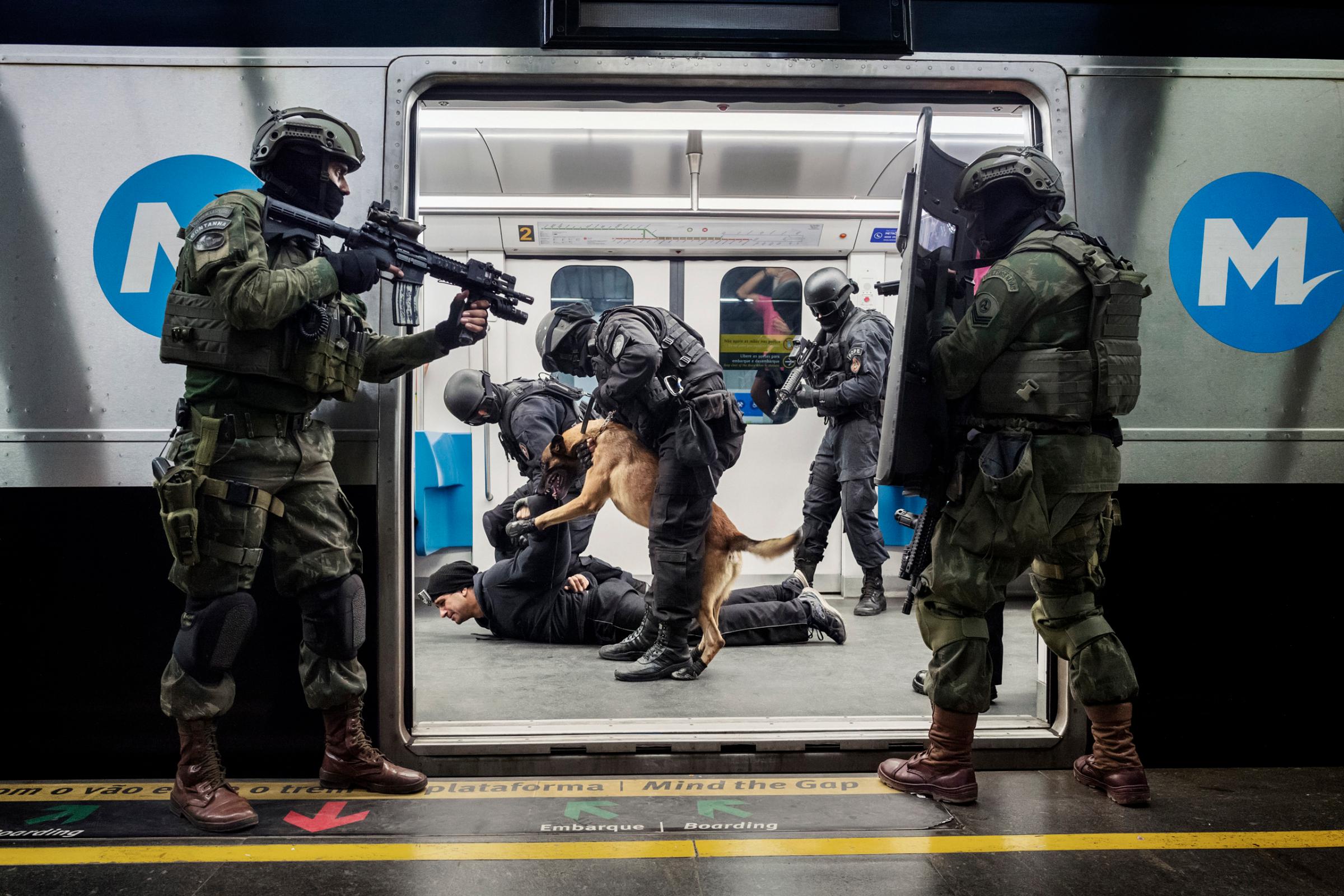 Anti-terrorism exercise in tubular structures (metro, trains,É) by members of BOPE (Battalion of Special Police Operations) in a subway train at Estaao station in Rio de Janeiro. The BOPE members have been trained by members of the French RAID.