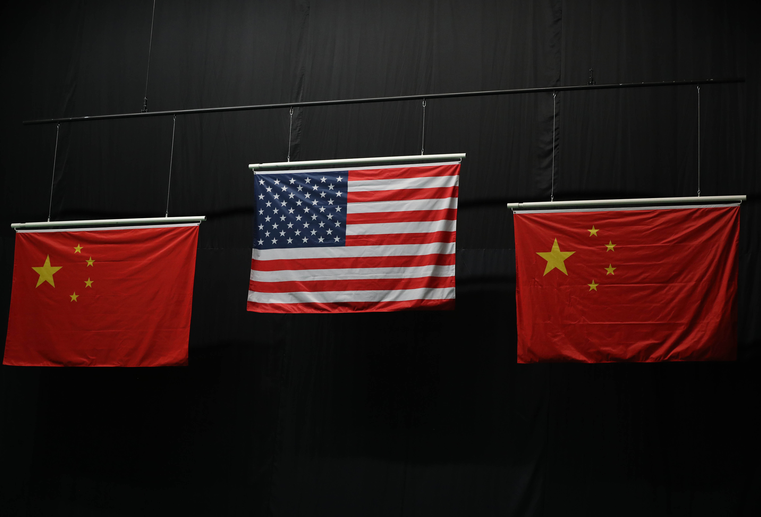 The American flag flies above the Chinese flags after Virginia Thrasher took the gold medal in the 10m air rifle competition at Olympic Shooting Centre in Rio de Janeiro, on Aug 6, 2016. (Geoff Burke-USA TODAY Sports/Reuters)