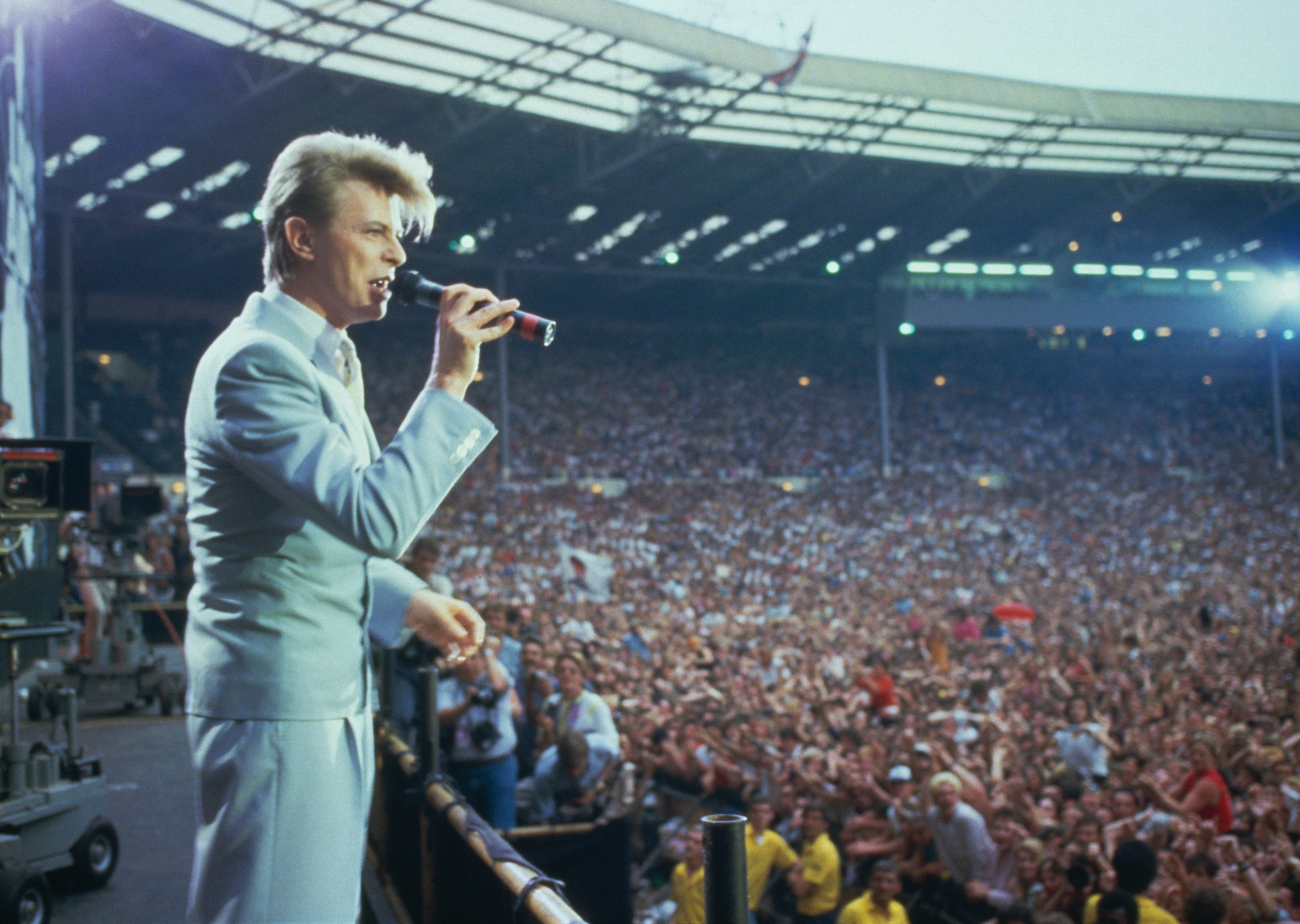English singer David Bowie performing at the Live Aid concert at Wembley Stadium in London, 13th July 1985. The concert raised funds for famine relief in Ethiopia. (Photo by Georges De Keerle/Getty Images) (Georges De Keerle—Getty Images)