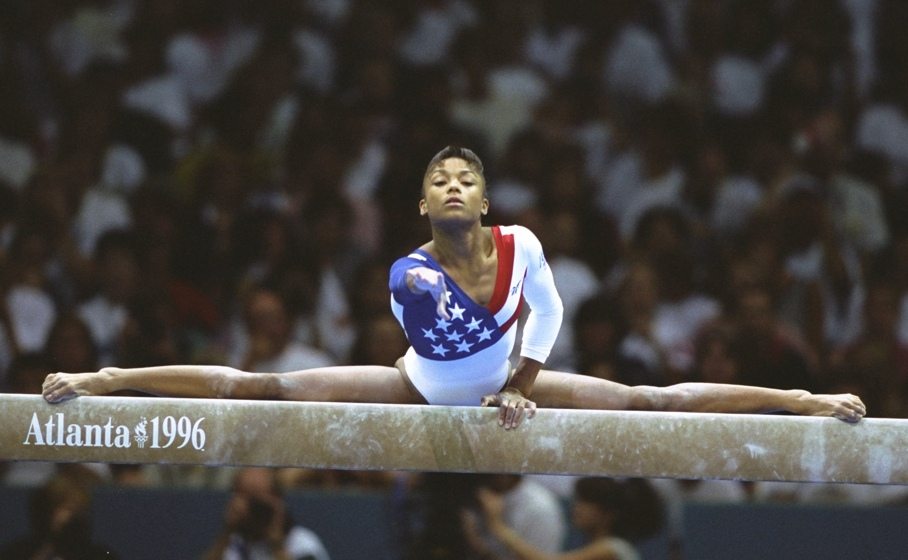 Dominique Dawes of the USA on the beam during the womens team gymnastics event at the Georgia Dome at the 1996 Centennial Olympic Games in Atlanta on July 23, 1996.