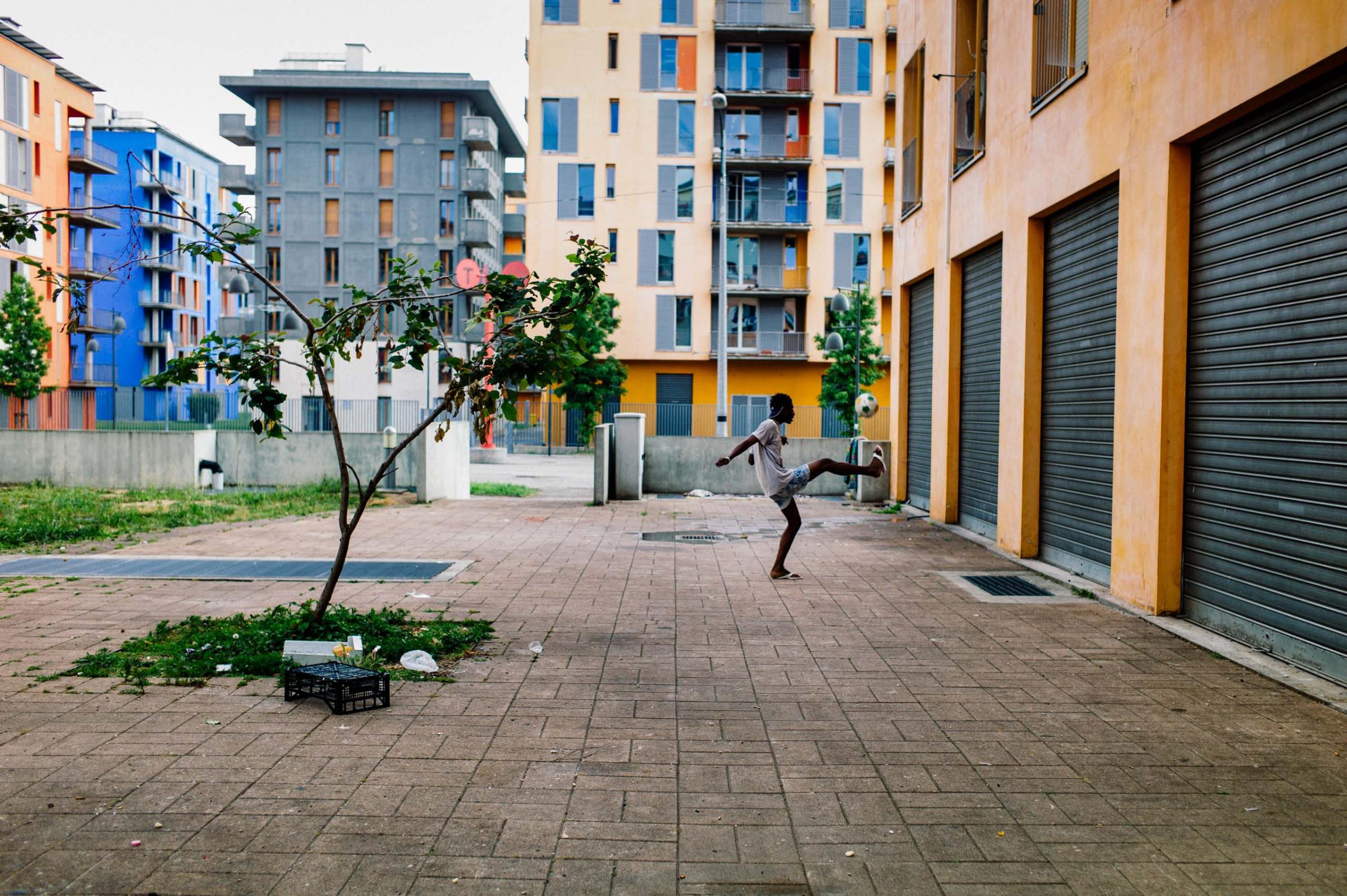 The Olympic Village in Turin, host of the 2006 Winter Olympics, photographed in June 2016. After sitting empty for years, the buildings became a home for squatters and later for more than 1,000 migrants and refugees, many from Africa.