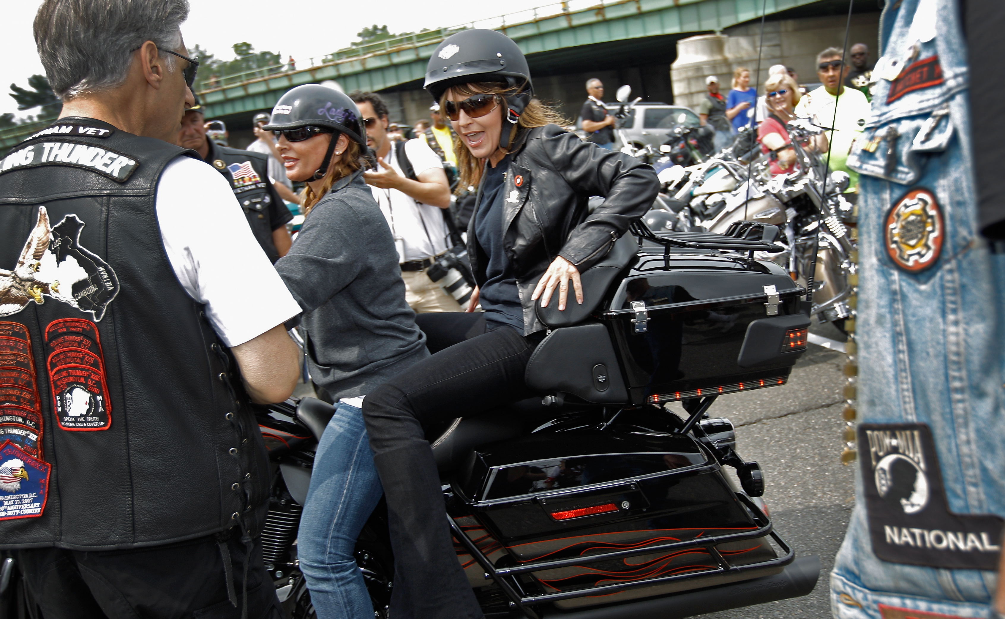 Former U.S. Vice presidential candidate and Alaska Governor Sarah Palin rides on a motorcycle during the  Rolling Thunder  Memorial Day weekend parade May 29, 2011 in Arlington, Virginia.