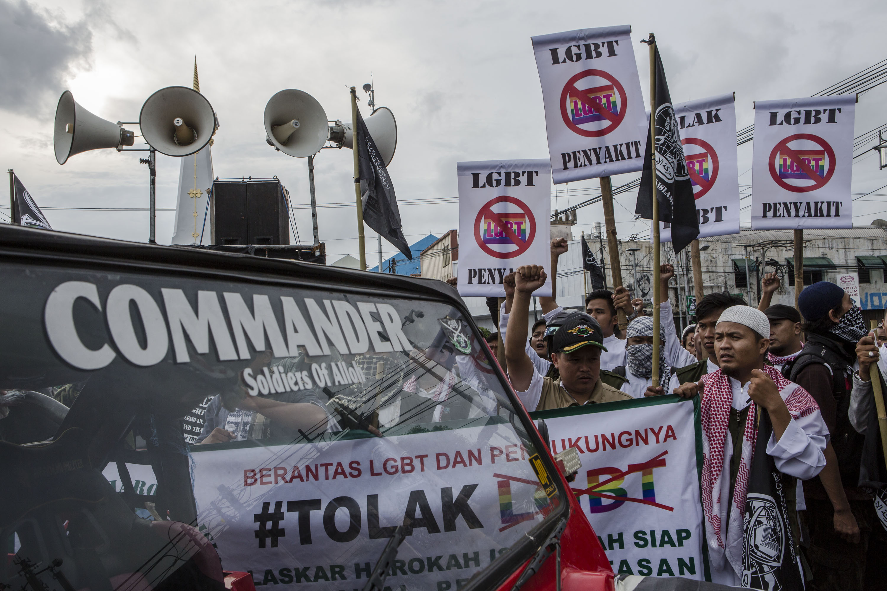 Anti-LGBT activists protest on Feb. 23, 2016, in Yogyakarta, Indonesia (Ulet Ifansasti—Getty Images)