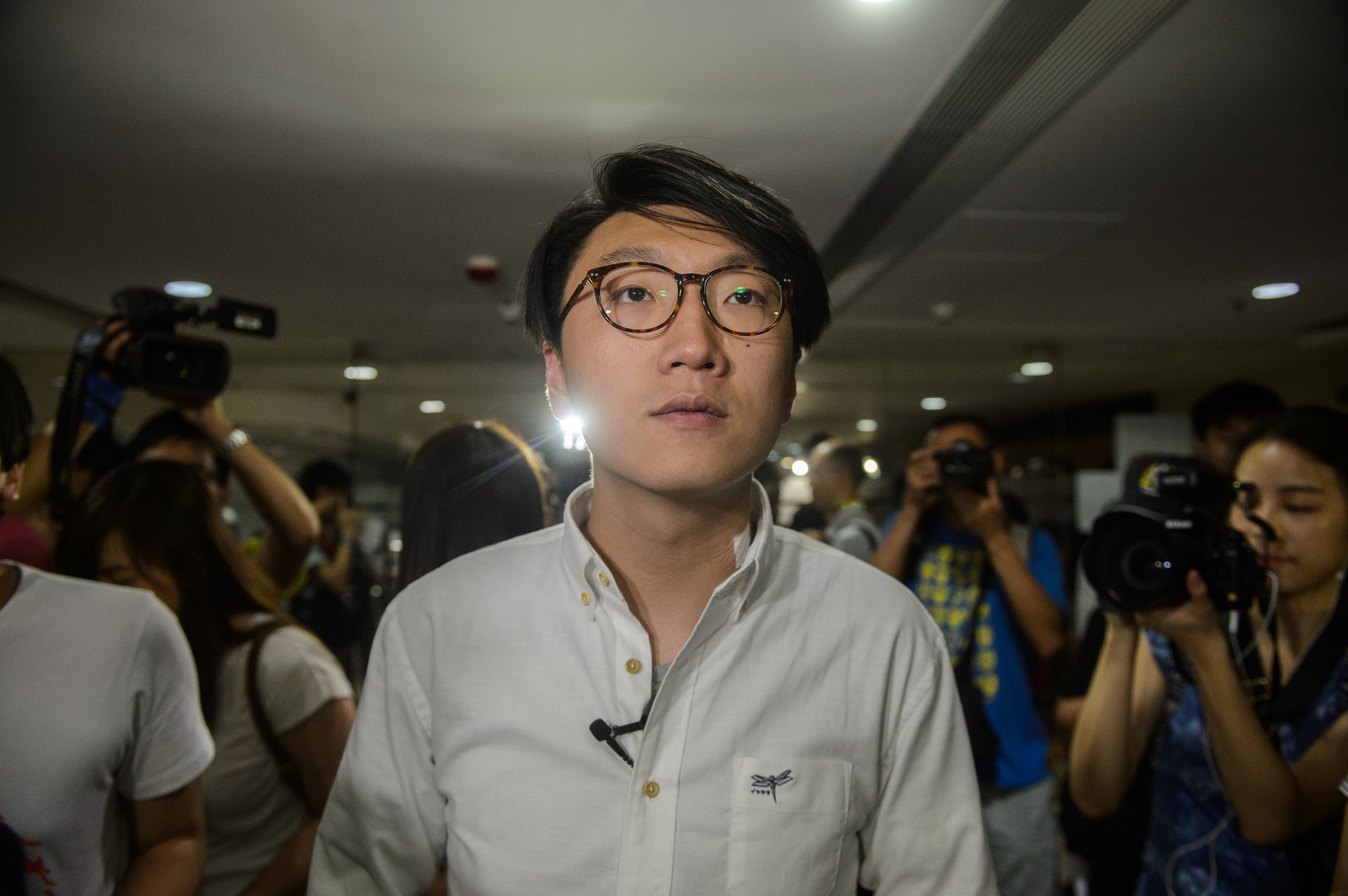 Edward Leung of the Hong Kong Indigenous party, arrives at the 2016 Legislative Council Election Briefing for Candidates in Hong Kong on August 2, 2016. (Anthony Wallace—AFP/Getty Images)