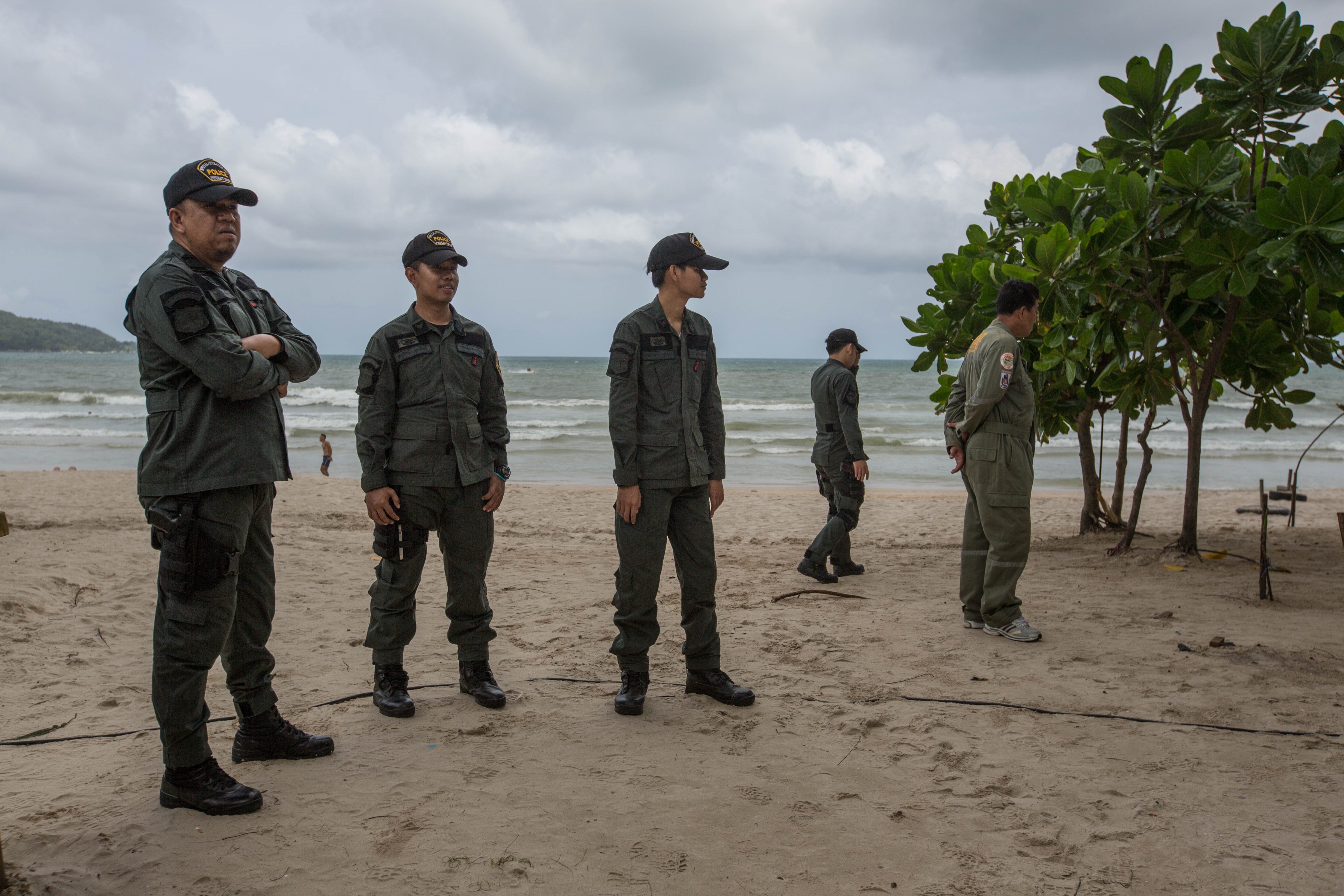 Thai security forces stand guard at the scene of a blast near Patong beach on Phuket, Thailand, on Aug. 12, 2016 (Guillaume Payen—Anadolu Agency/Getty Images)