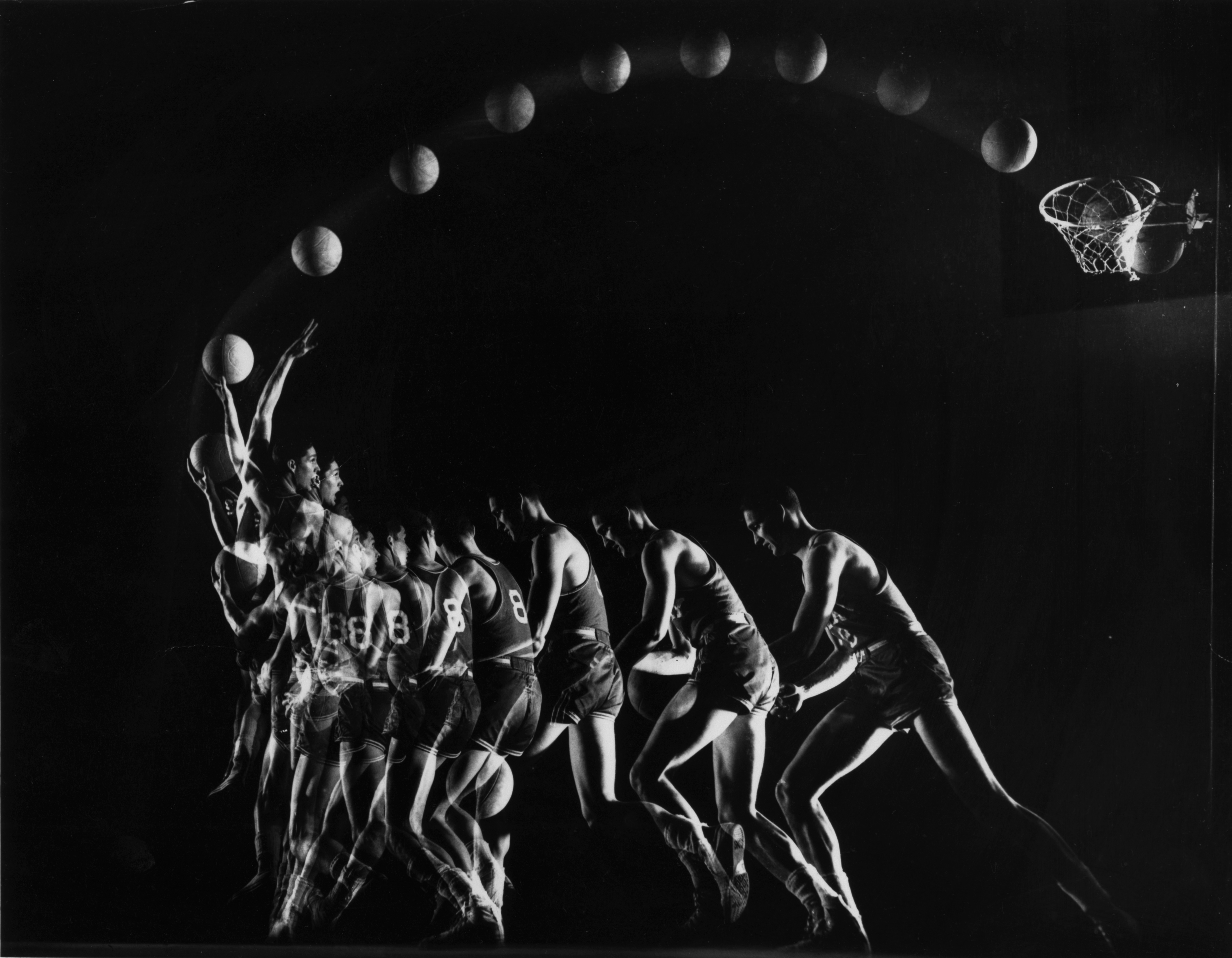 A stroboscopic multiple exposure image shows Yale basketball star Tony Lavelli demonstrating his one-handed hook shot in 1949.
