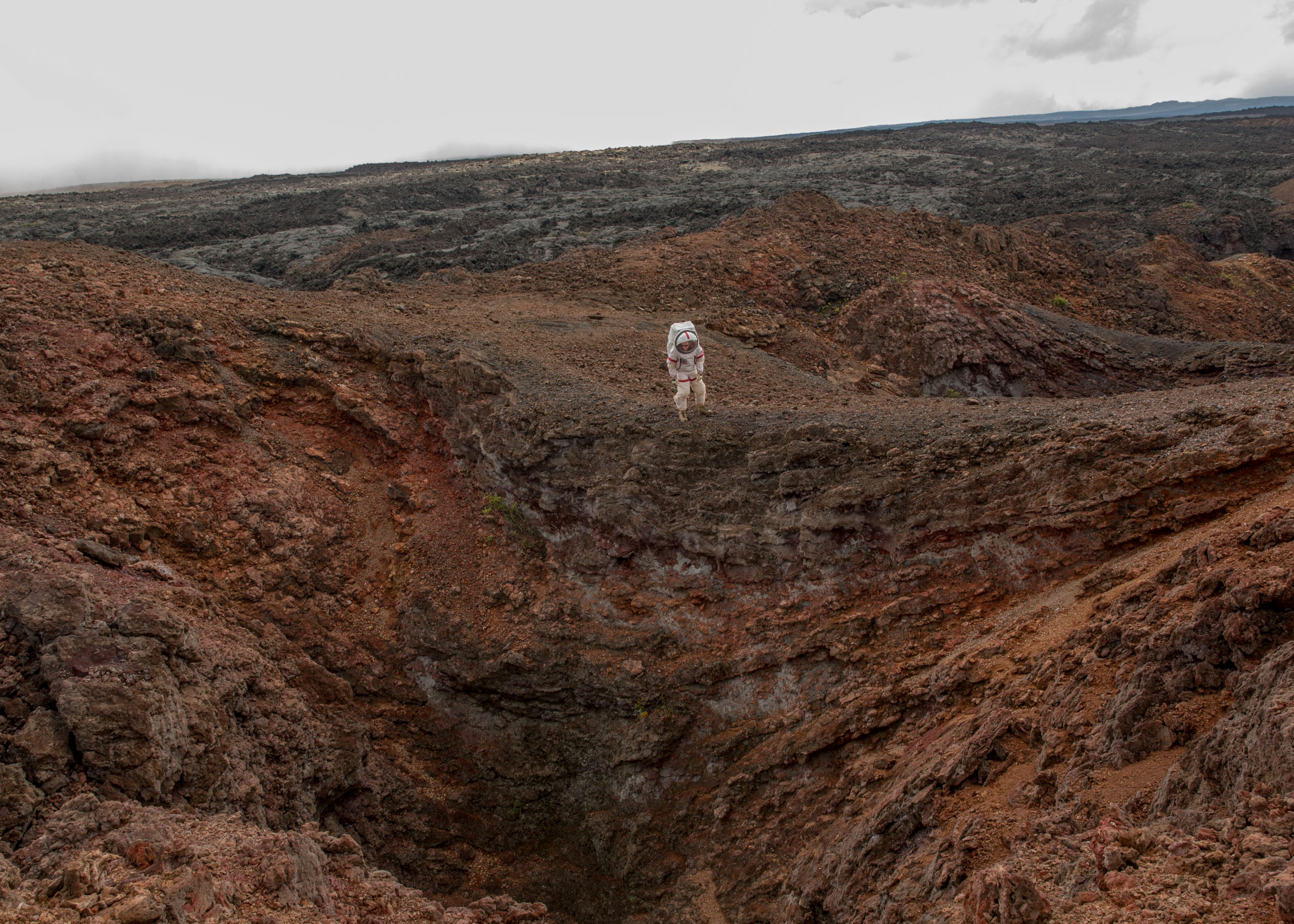 Carmel Johnston, Crew Commander for Mission 4, reenacts a spacewalk in a lava field near the HI-SEAS habitat on the island of Hawaii on Aug. 29, 2016. The crew emerged from 365 days in isolation on Aug. 28. (Cassandra Klos for TIME)