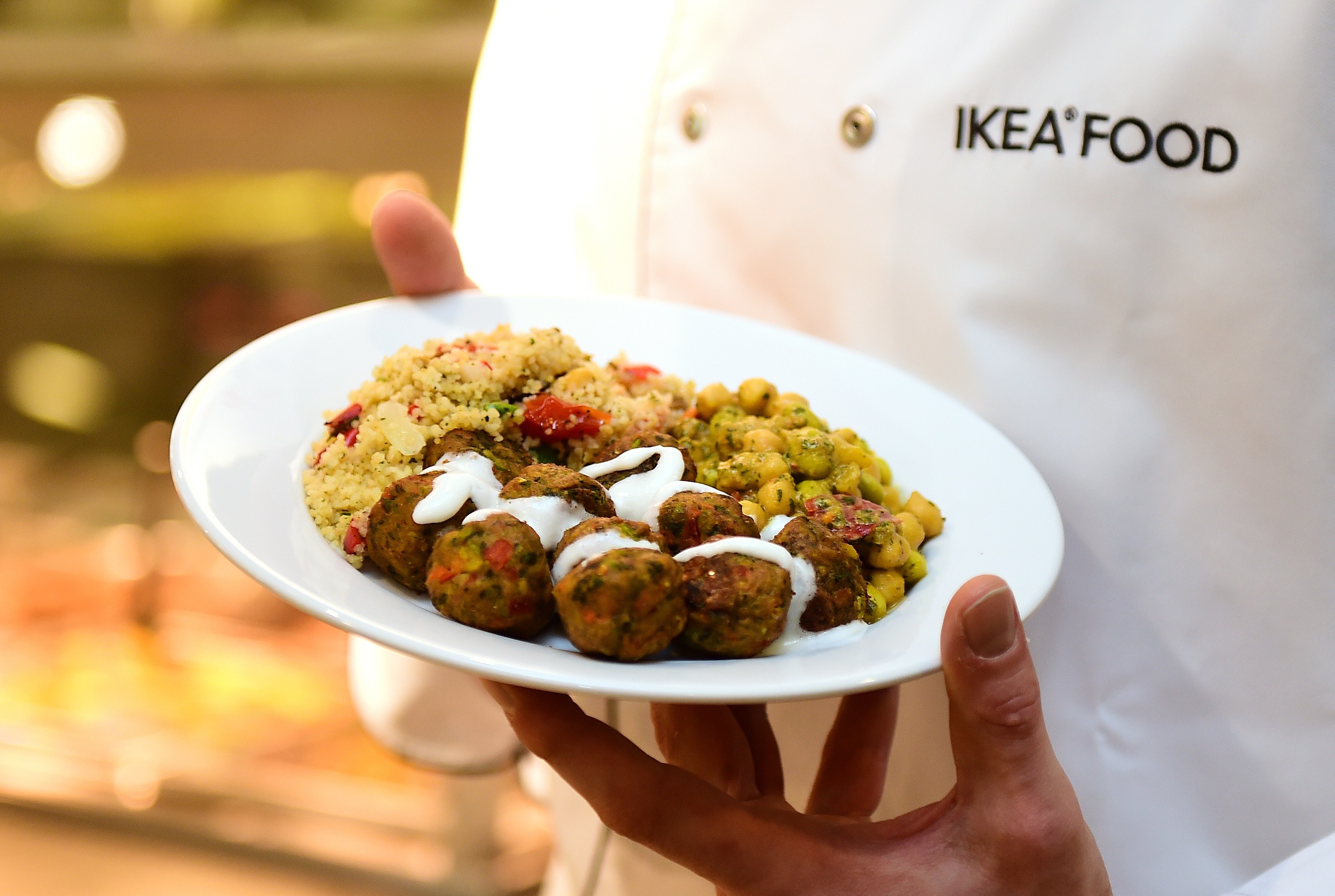 An IKEA employee displays the new IKEA vegetarian meatballs, during a worldwide launch at IKEA Anderlecht, on April 8, 2015. (EMMANUEL DUNAND&mdash;AFP/Getty Images)