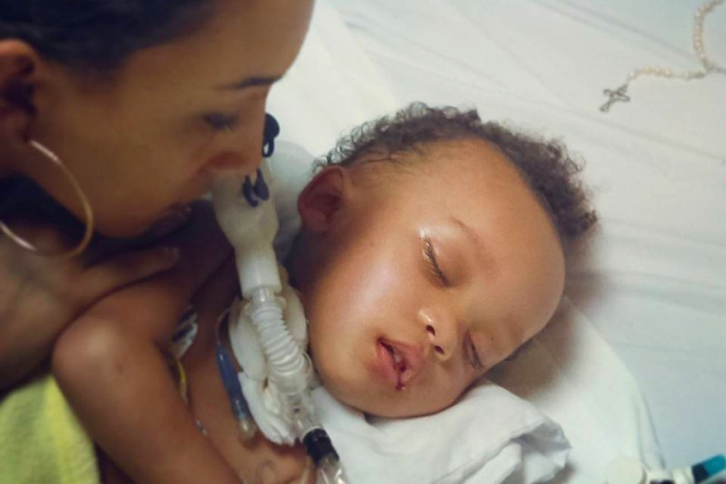 This undated photo provided by Jonee Fonseca shows her with her 2-year-old son Israel Stinson while on life support in a California hospital. The brain-dead toddler died Thursday, Aug. 25, 2016, soon after being taken off life support under a judge's order, bringing a sudden end to a complex legal battle that had appeared it was going to go on much longer. A Los Angeles Superior Court judge Thursday ruled to dissolve the temporary restraining order keeping Stinson on life support. (Courtesy Jonee Fonseca via AP)