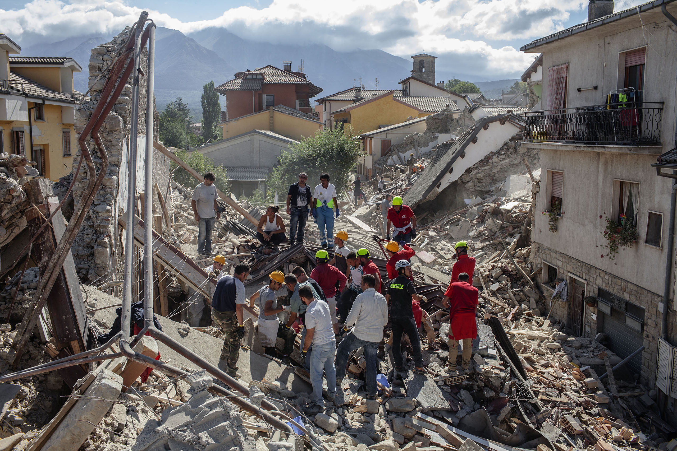 Rescue teams look for survivors in Amatrice, Italy, on Aug. 24, 2016.