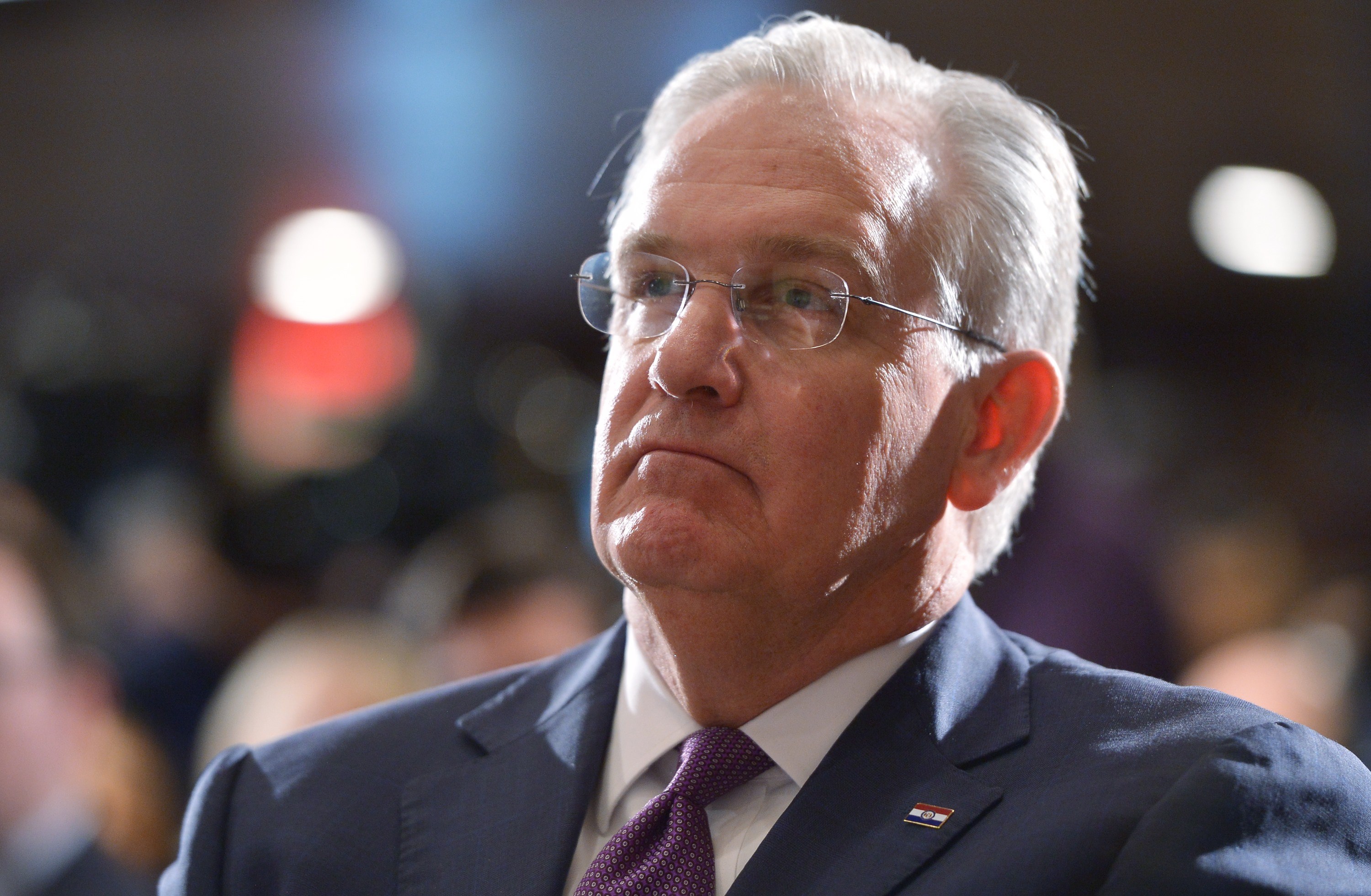 Missouri Gov. Jay Nixon listens to a speaker during the launch of the U.S. Agriculture Coalition for Cuba at the National Press Club on Jan. 8, 2014 in Washington, DC. (Mandel Ngan—AFP/Getty Images)