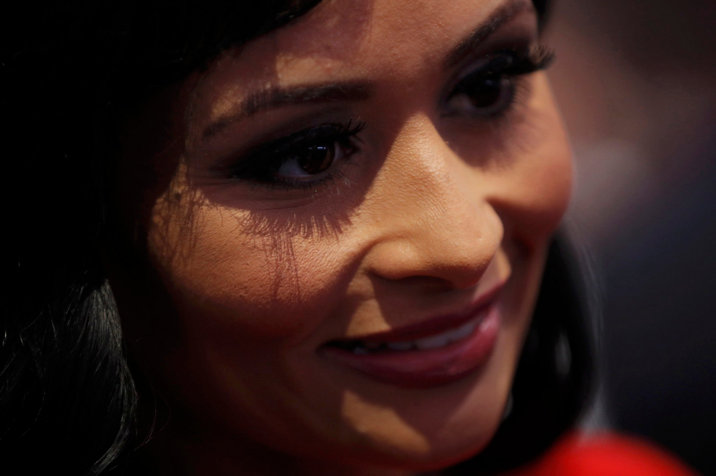 Republican presidential nominee Donald Trump's spokesperson Katrina Pierson speaks with delegates on the floor at the start of the final session of the Republican National Convention in Cleveland on July 21, 2016.
