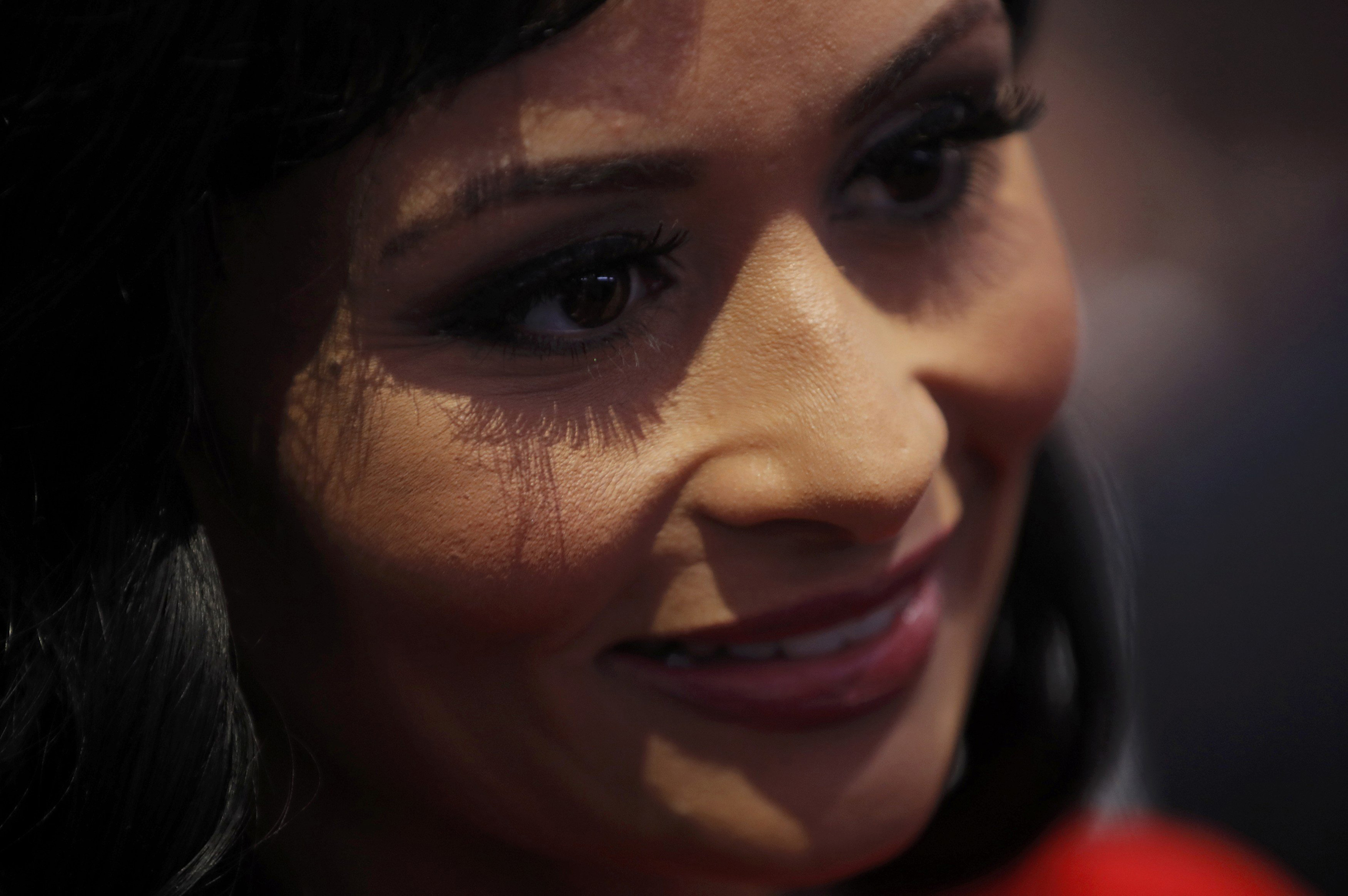 Republican presidential nominee Donald Trump's spokesperson Katrina Pierson speaks with delegates on the floor at the start of the final session of the Republican National Convention in Cleveland on July 21, 2016. (Brian Snyder—Reuters)