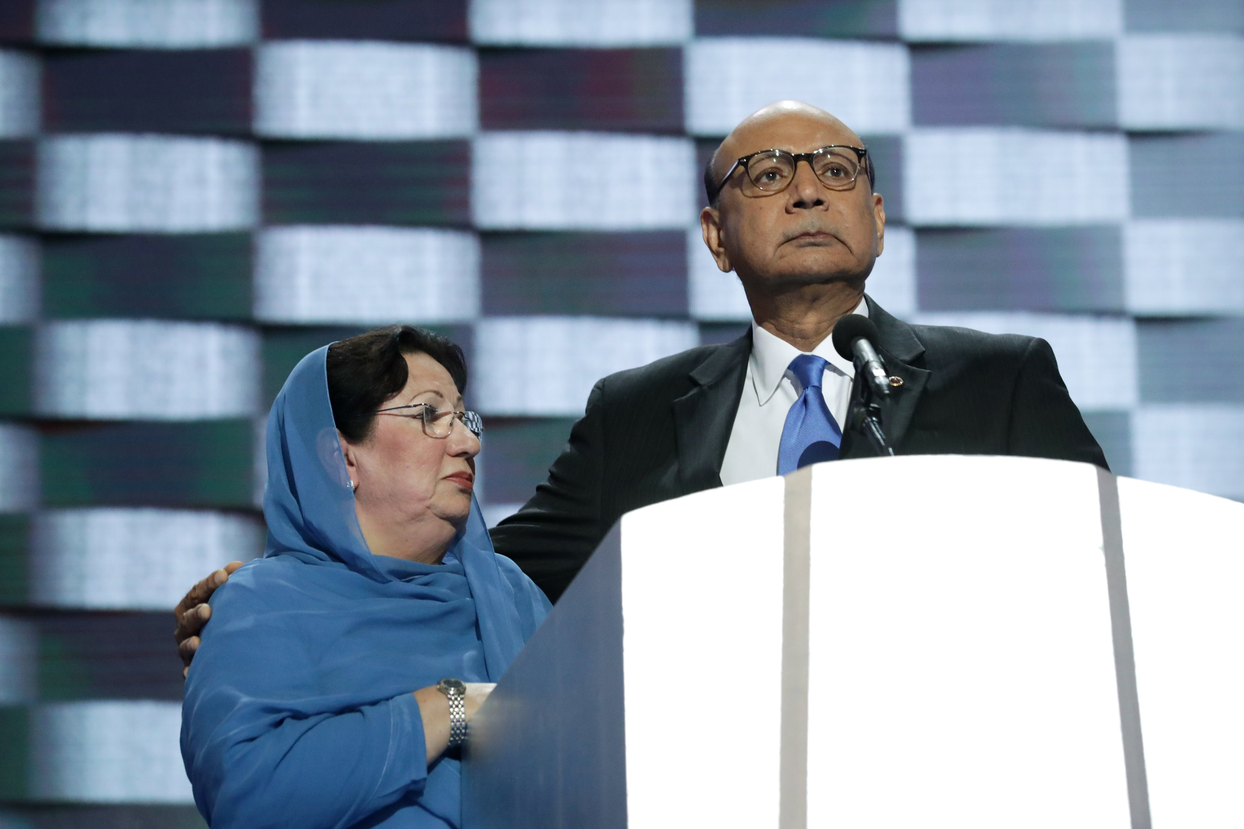 Khizr Khan, father of deceased U.S. Army Capt. Humayun Khan, delivers remarks as he is joined by his wife Ghazala Khan at the Democratic National Convention on July 28, 2016. (Joe Raedle&mdash;Getty Images)