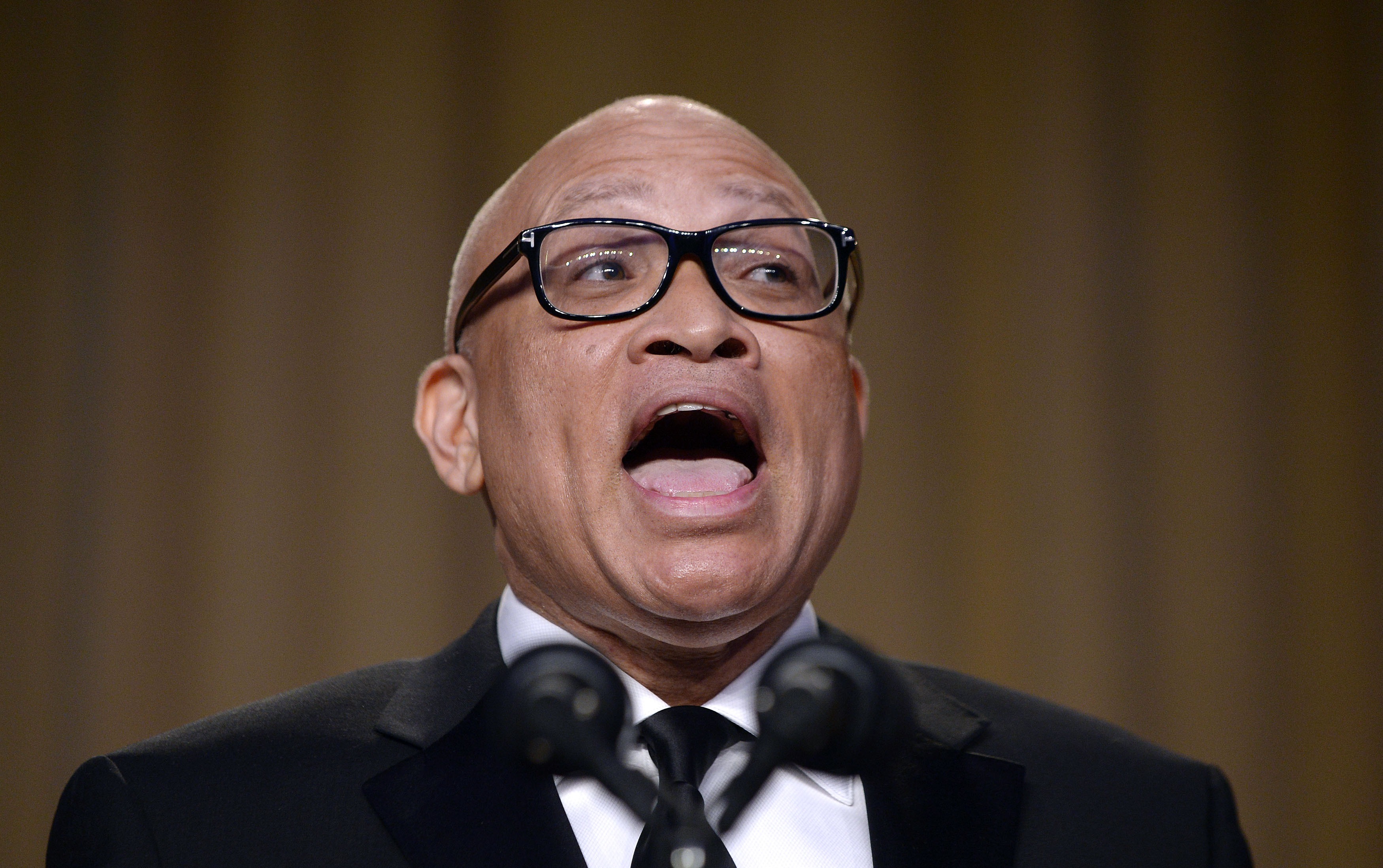 WASHINGTON, DC - APRIL 30: (AFP OUT) Comedian Larry Wilmore speaks during the White House Correspondents' Association annual dinner on April 30, 2016 at the Washington Hilton hotel in Washington.This is President Obama's eighth and final White House Correspondents' Association dinner. (Olivier Douliery-Pool—Getty Images)