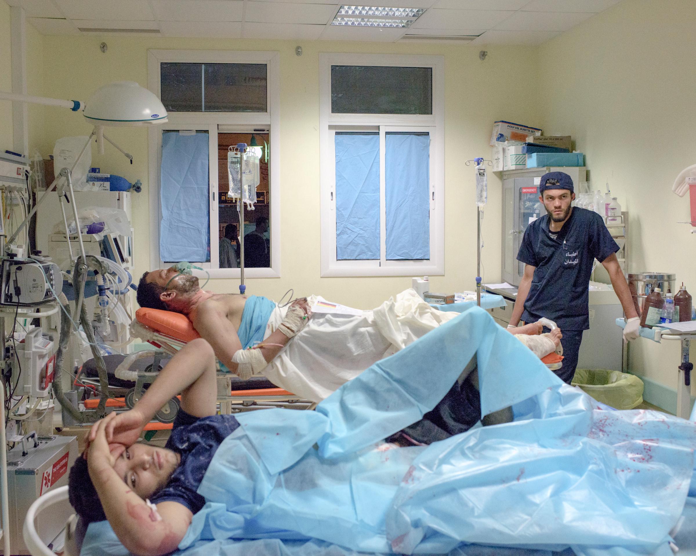 Two Libyan fighters who were wounded on the frontline against ISIS were taken to the emergency room of Misurata Central Hospital, Misurata. July 2016.
