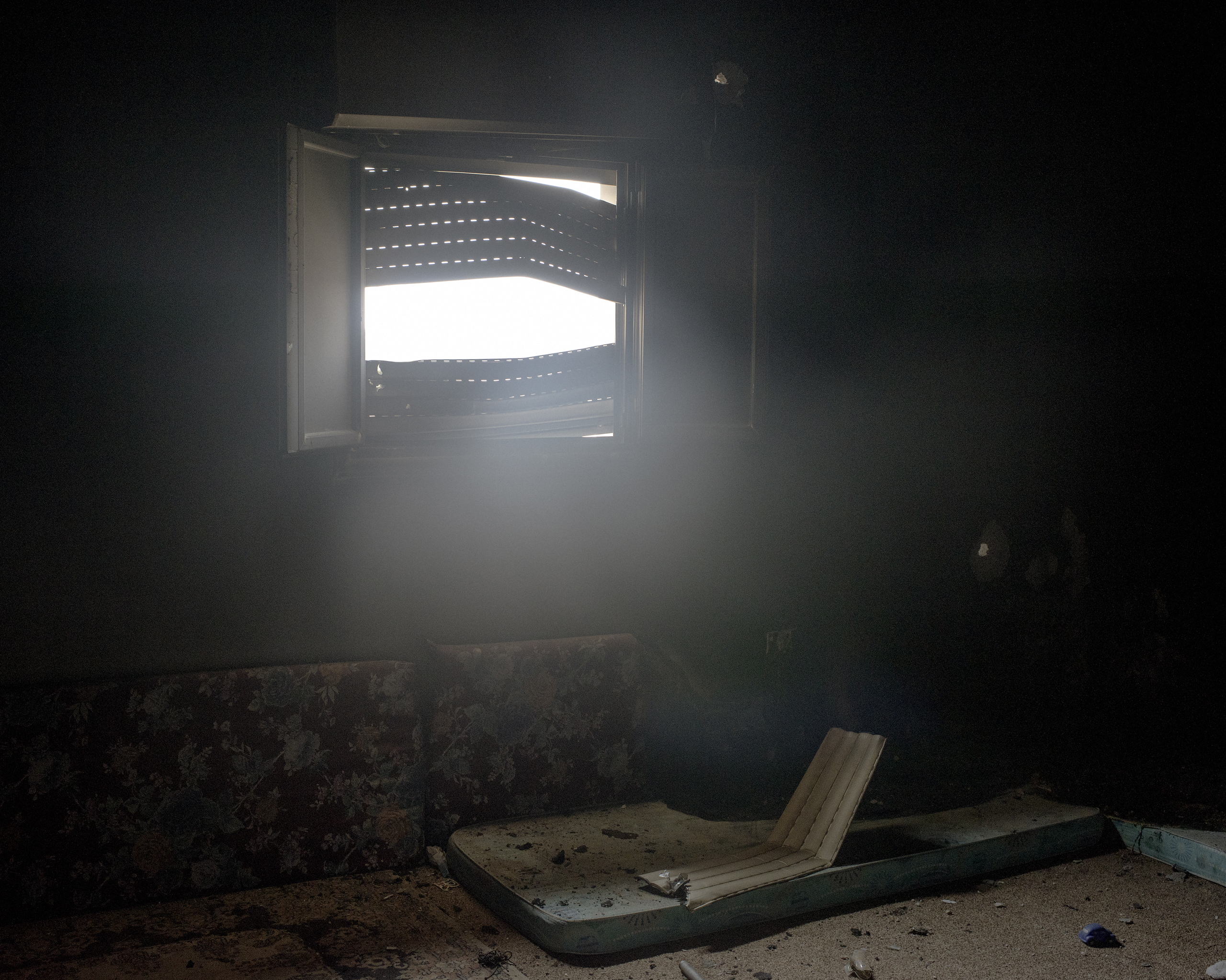 A burned-out room in territory newly-liberated  by Libyan fighters from ISIS, Sirt, July 2016.
