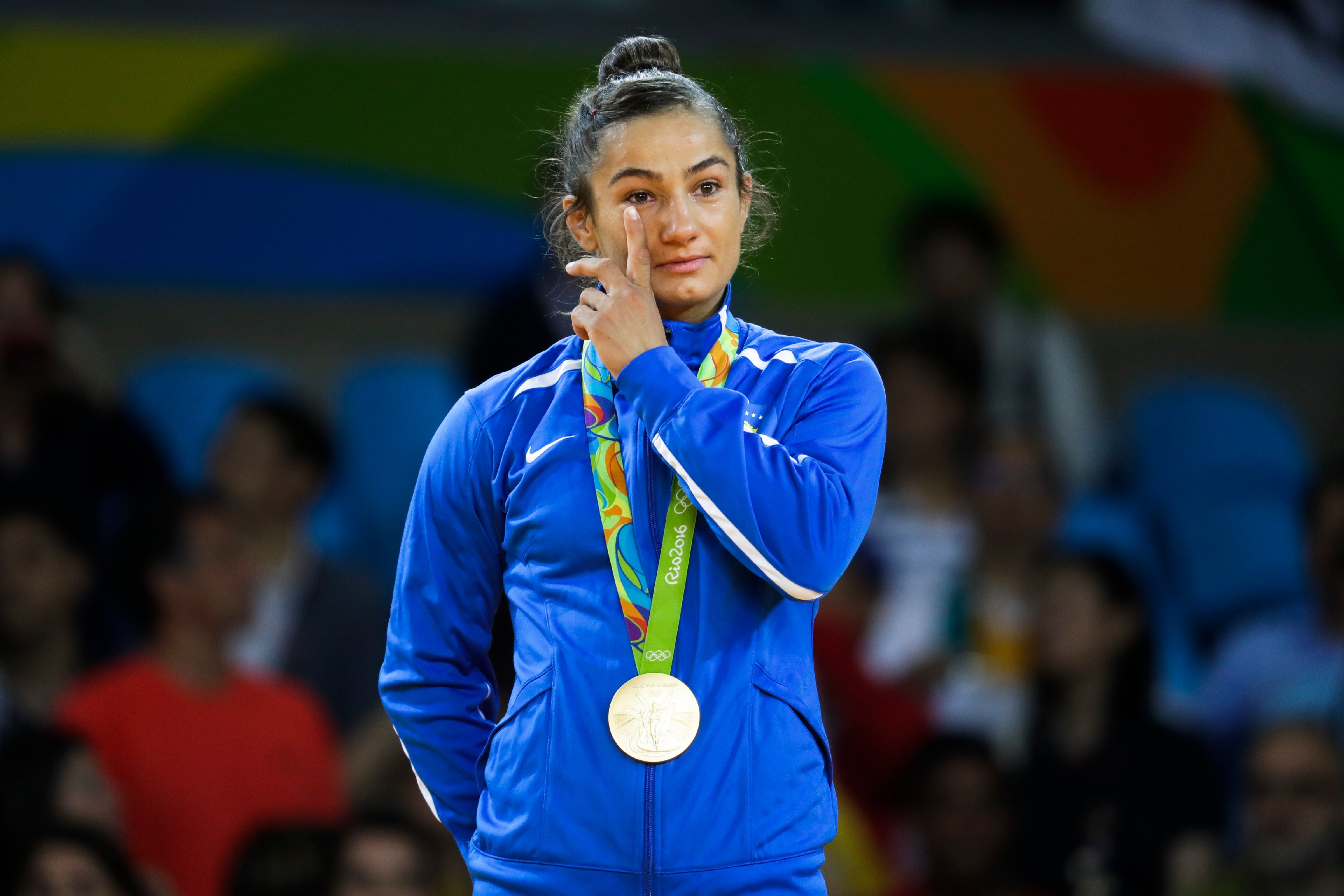 Kosovo's Majlinda Kelmendi receives the gold medal after winning the women's 52-kg judo competition at the 2016 Summer Olympics in Rio de Janeiro, Brazil, Sunday, Aug. 7, 2016. (Markus Schreiber—AP)