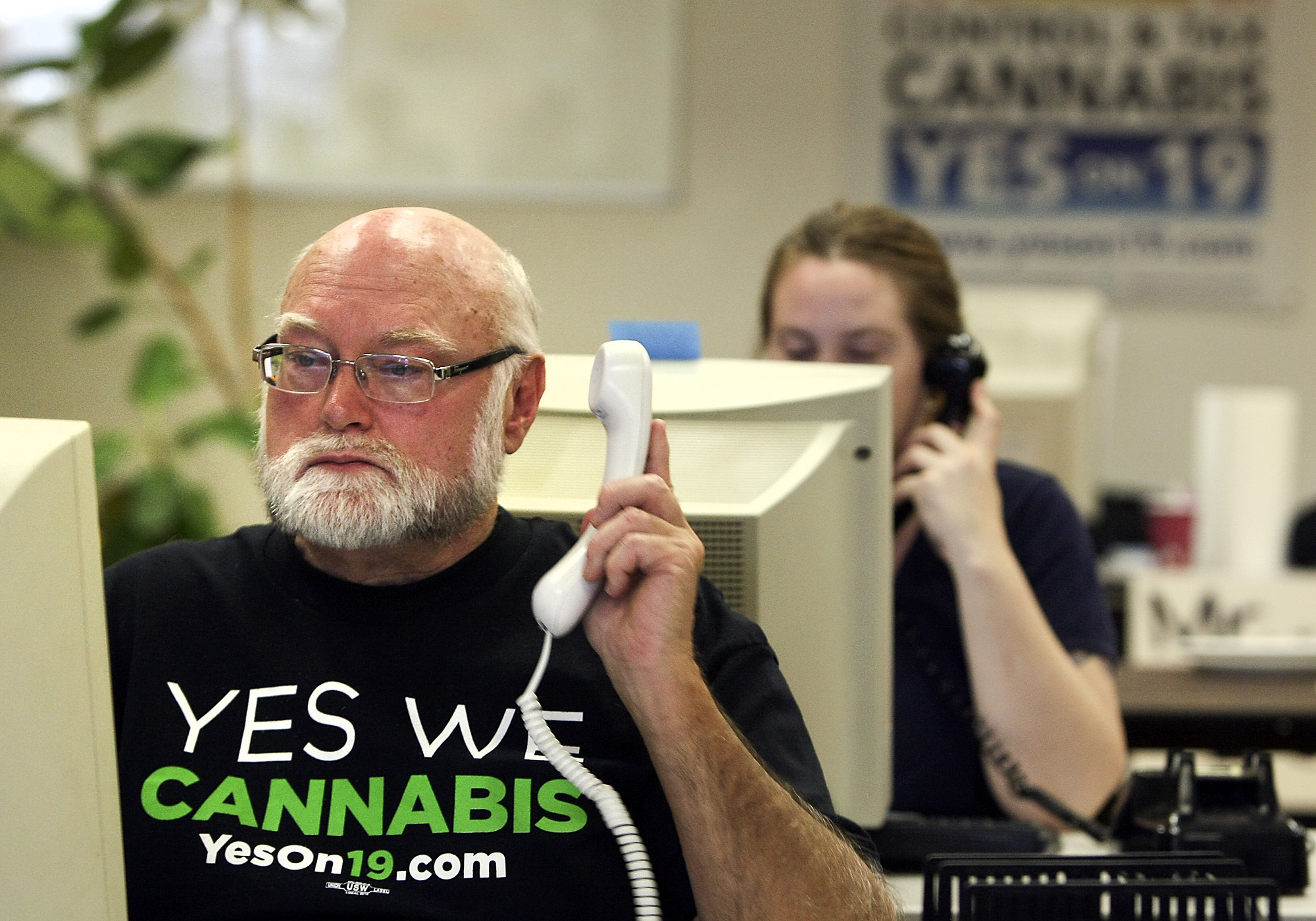 Volunteer Gregory Lyons, 63, of Oakland, makes calls at Oaksterdam University in support of Prop 19, a marijuana legalization initiative, in Oakland on Nov. 2 2010. (Brian van der Brug_LA Times via Getty Images)