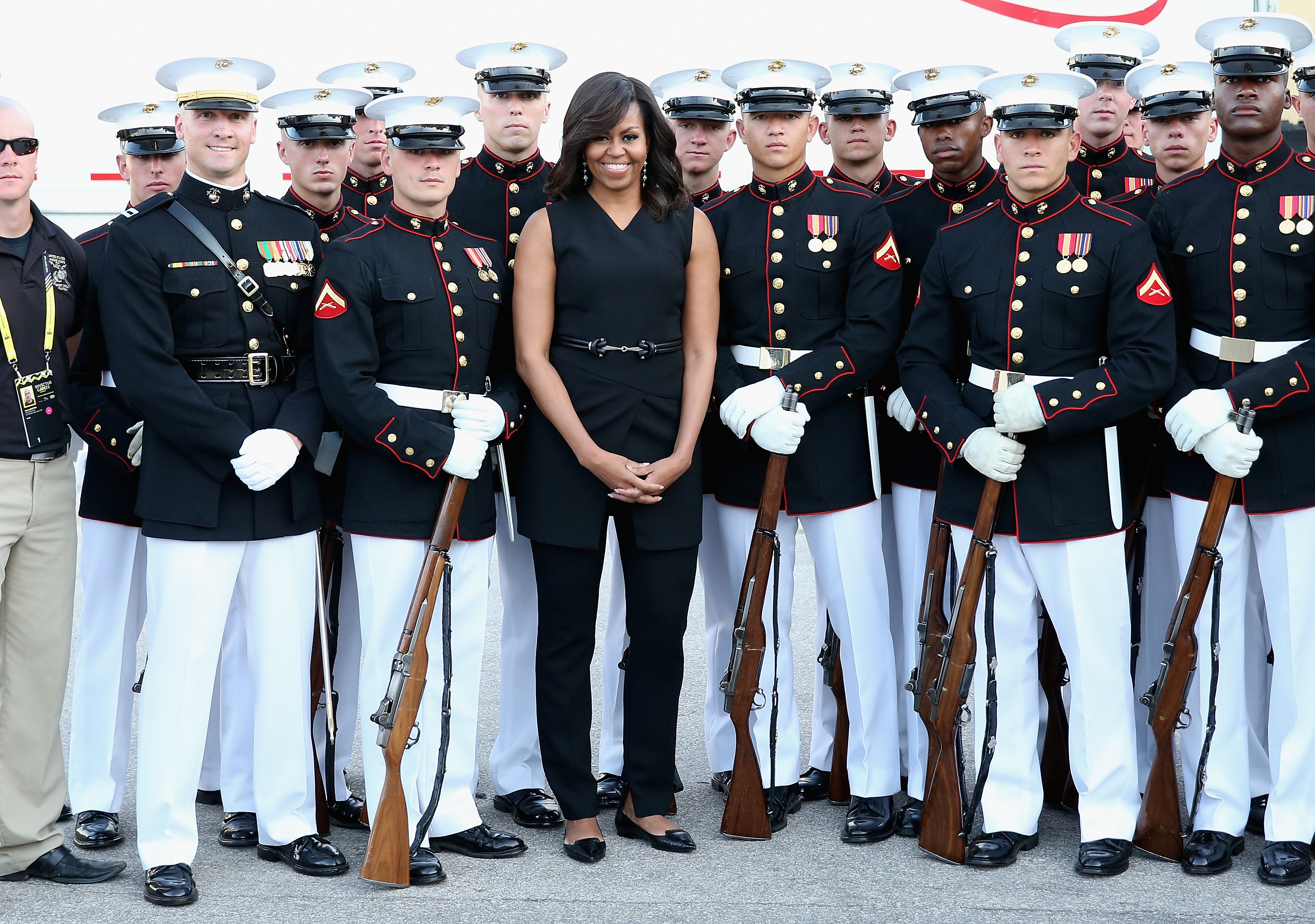First Lady Michelle Obama poses with the U.S. Marine Corps Silent Drill Platoon ahead of the Opening Ceremony of the Invictus Games Orlando 2016 at ESPN Wide World of Sports on May 8, 2016 in Orlando, Florida. (Chris Jackson—Getty Images for Invictus)