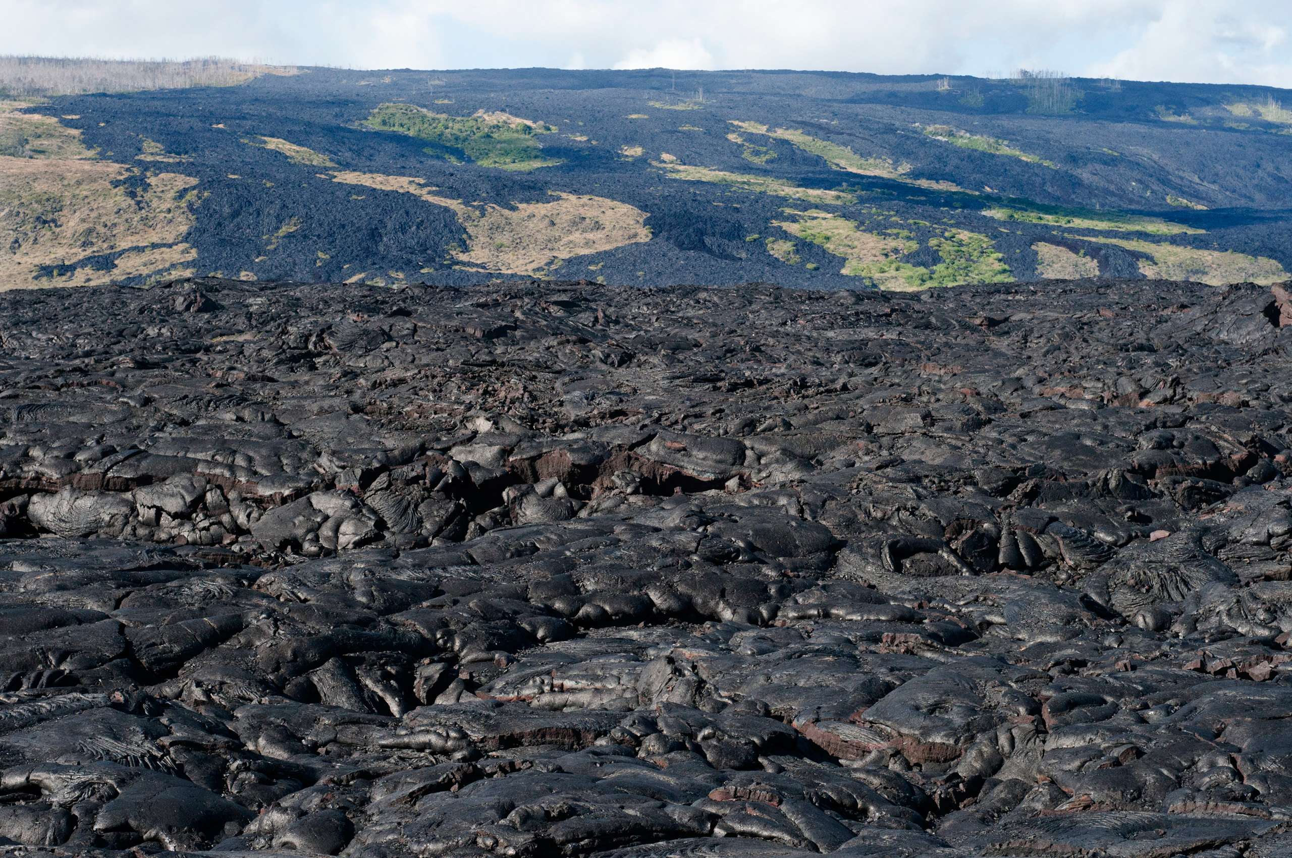 Black lava mountains near the coast and highway Chain of Crater Road on Big Island, Hawaii. (Sergi Reboredo—picture-alliance/dpa/AP)