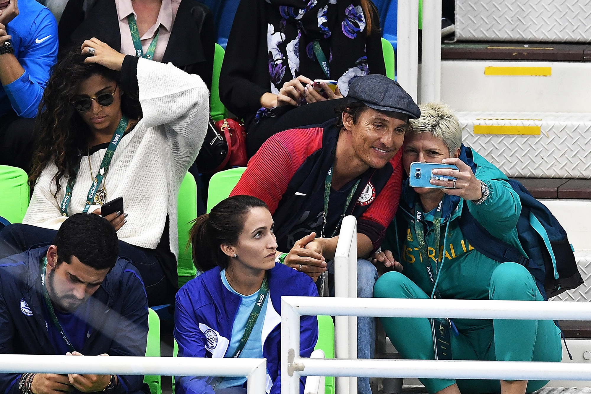 Matthew McConaughey takes a selfie with a guest during the swimming semifinals and finals on Day 5 of the Rio 2016 Olympic Games, on Aug. 9, 2016 in Rio de Janeiro, Brazil.