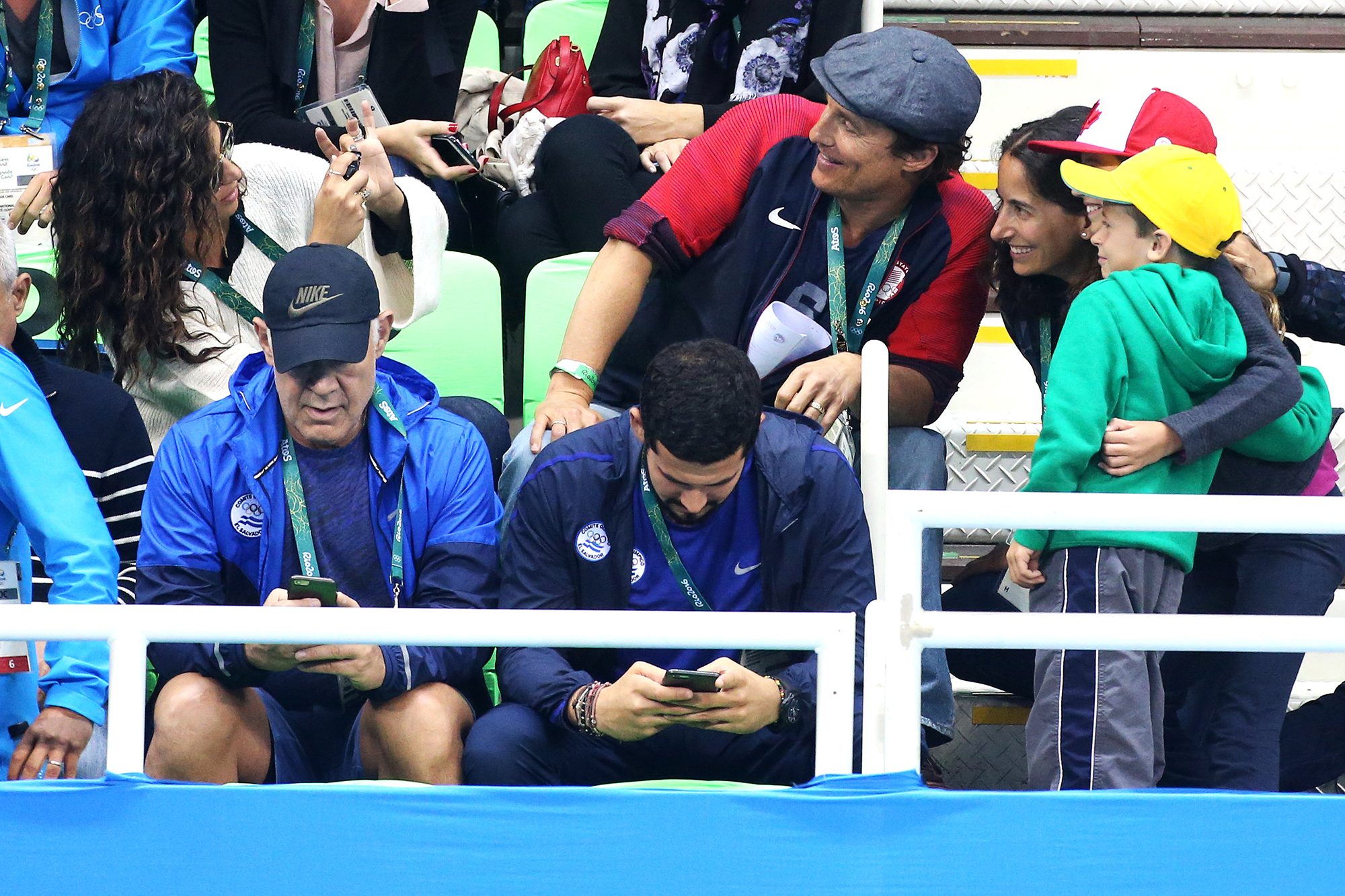 Camila Alves takes a picture of Matthew McConaughey with fans during the swimming finals on day 5 of the Rio 2016 Olympic Games, on Aug. 10, 2016 in Rio de Janeiro, Brazil.